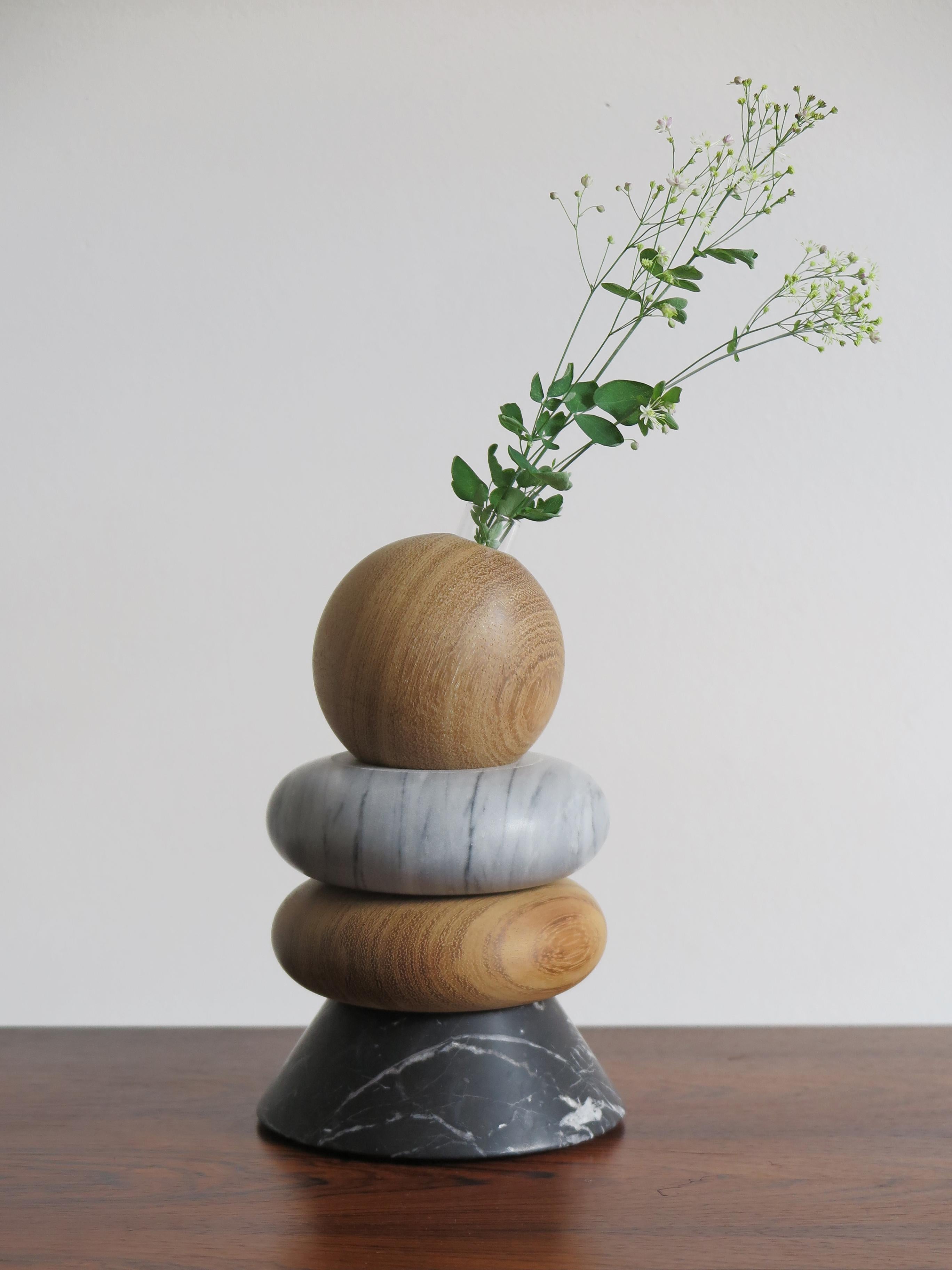 Contemporary handmade sculpture, candleholder, flower vase modular as you like made up of two marbles:
Carrara white, Grey Bardiglio, solid wood and glass ampoule for fresh flowers.

Designed for large, contemporary and luxurious environments