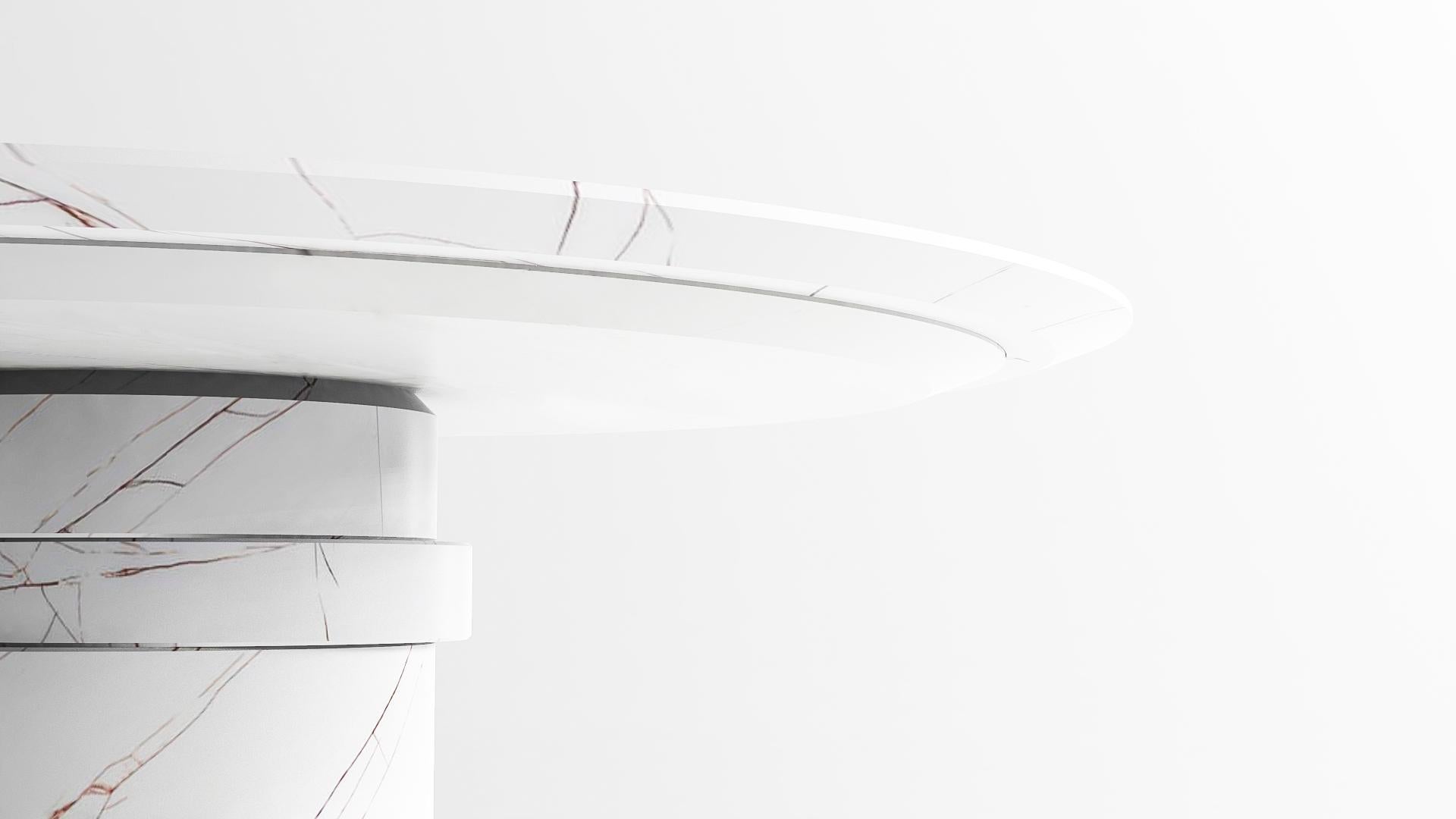 A refined and eye-pleasing design, extremely exclusive marble. The disc table is a seemingly round table of which the tabletop is supported by a central column, surprisingly interrupted by a decentralised disc. Our tables are manufactured by our