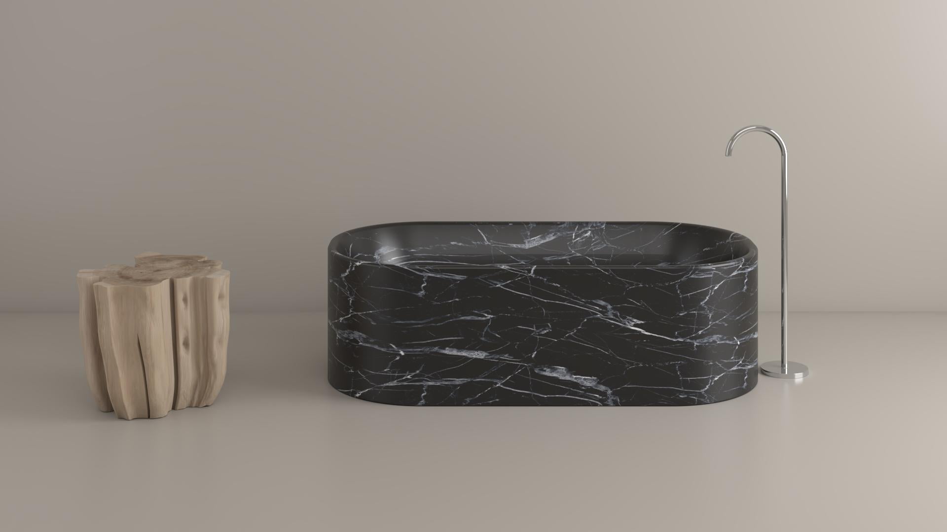 Carved tub from a solid block of stone. 