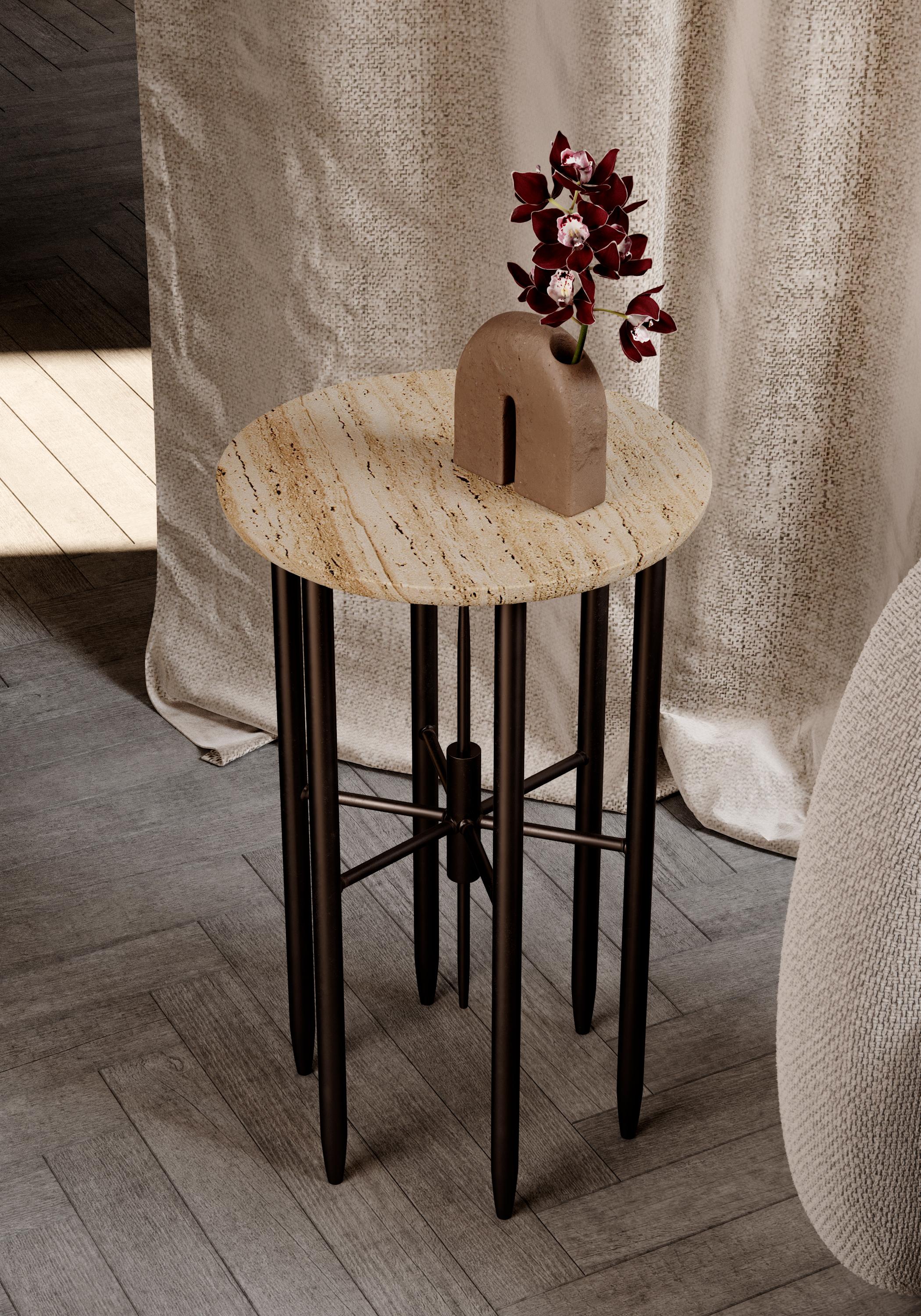 Our contemporary marble table includes the incredible diversity of the Middle Eastern culture into our Golestan series. Mirroring an architectural outline, a disc-shaped dark brown marble top sits elegantly on handcrafted iron legs bound together by