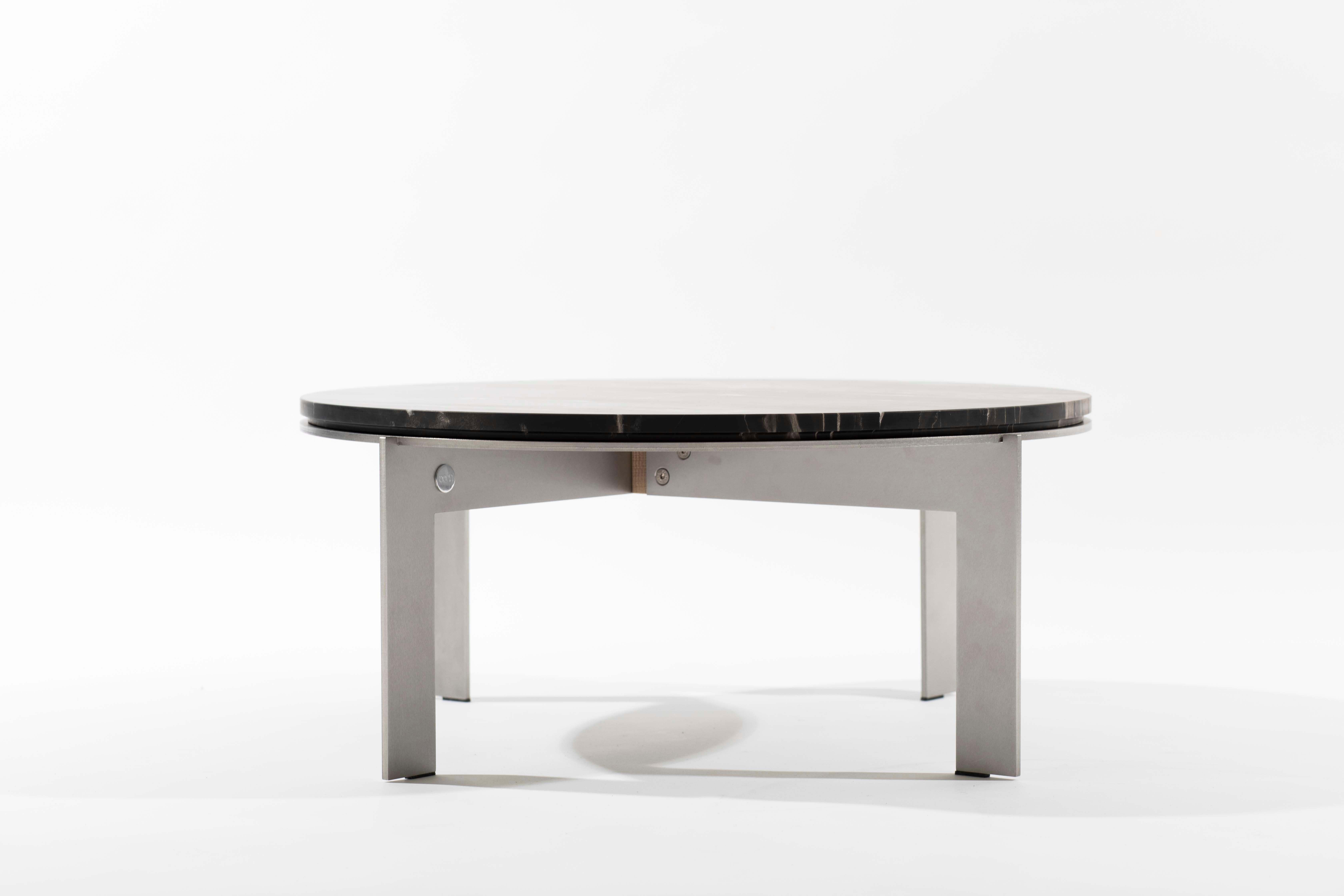 Joined is a collection of side tables. The name speaks for itself. The tables have one thing in common, they all exist around a crucial part, the joint, keeping all pieces together. Available in many shapes and materials. Every model can be finished