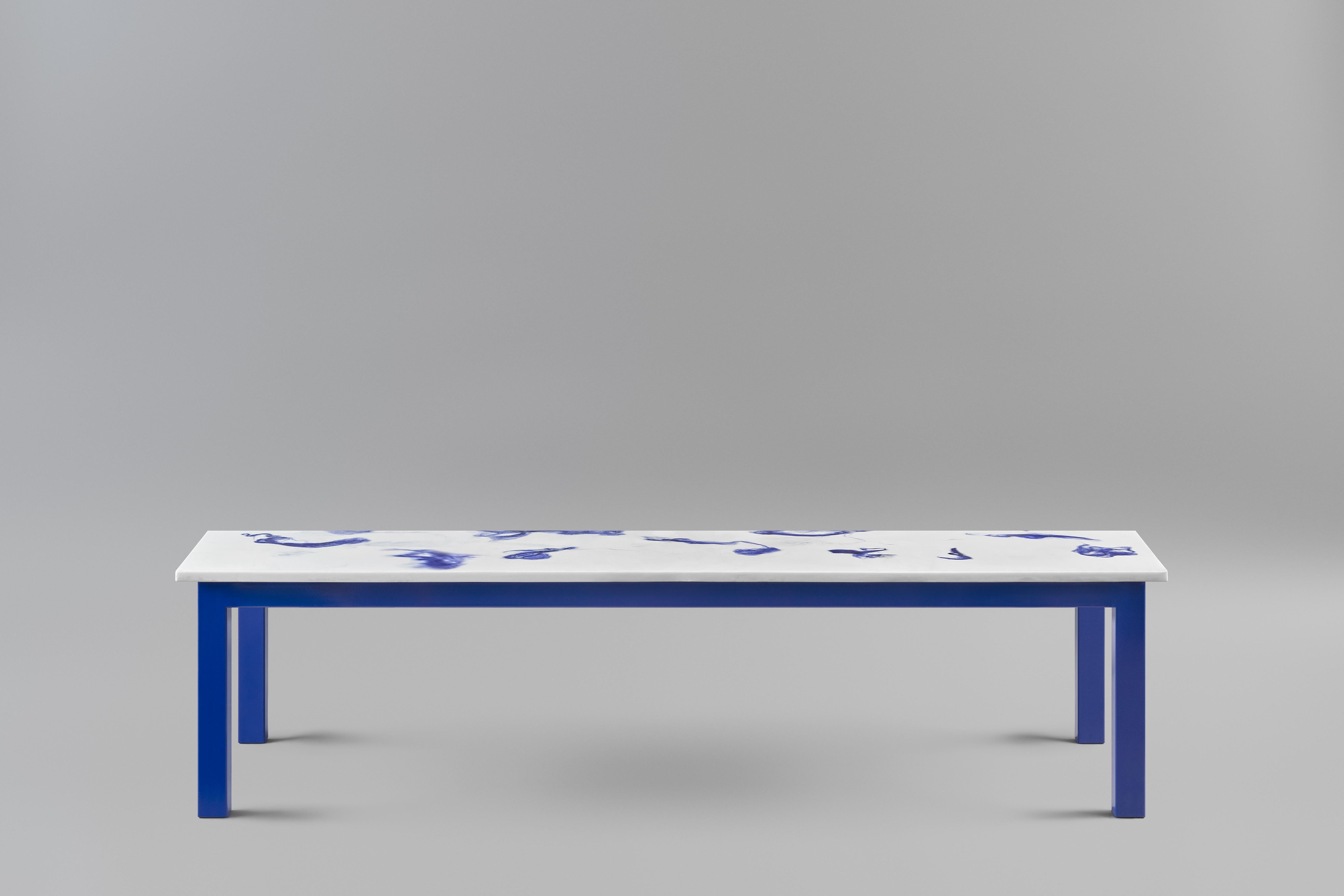 The fluent bench.
The tabletop is made in Marwoolus material with blue wool fibers and white Carrara marble powder base.
The steel frame structure is blue powder-coated.

Material info:
Marwoolus® is a new material invented by Marco Guazzini