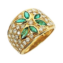 Rosior, bague jonc vintage en or jaune sertie d'émeraudes et de diamants taille marquise