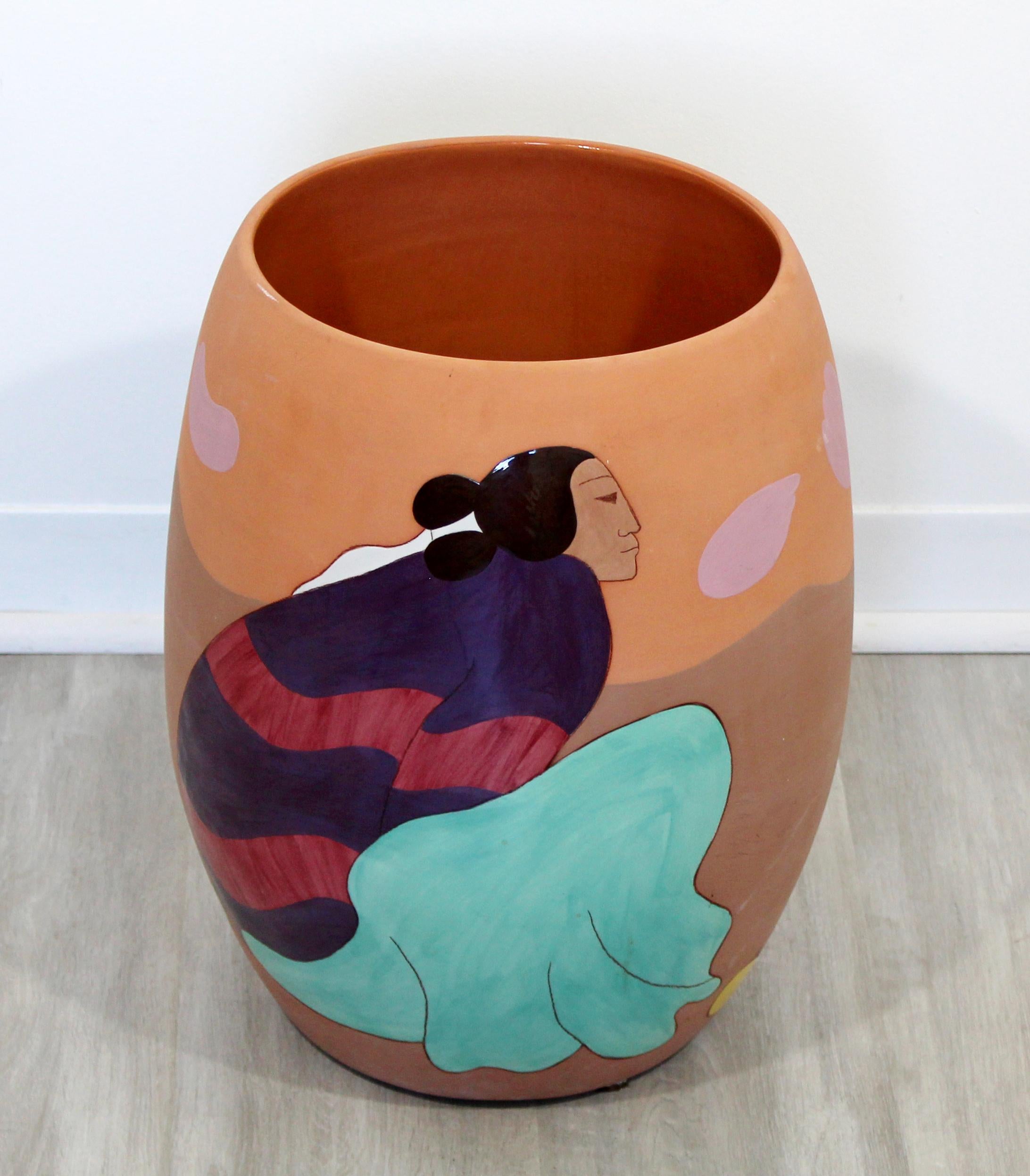 For your consideration is a massive, ceramic art vessel, with stunning paintings, signed R.C. Gorman Peras, numbered 188/200 and dated 1988. In excellent condition. The dimensions are 12