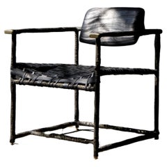 Sedia messicana contemporanea Umbral in bronzo fuso, legno e pelle