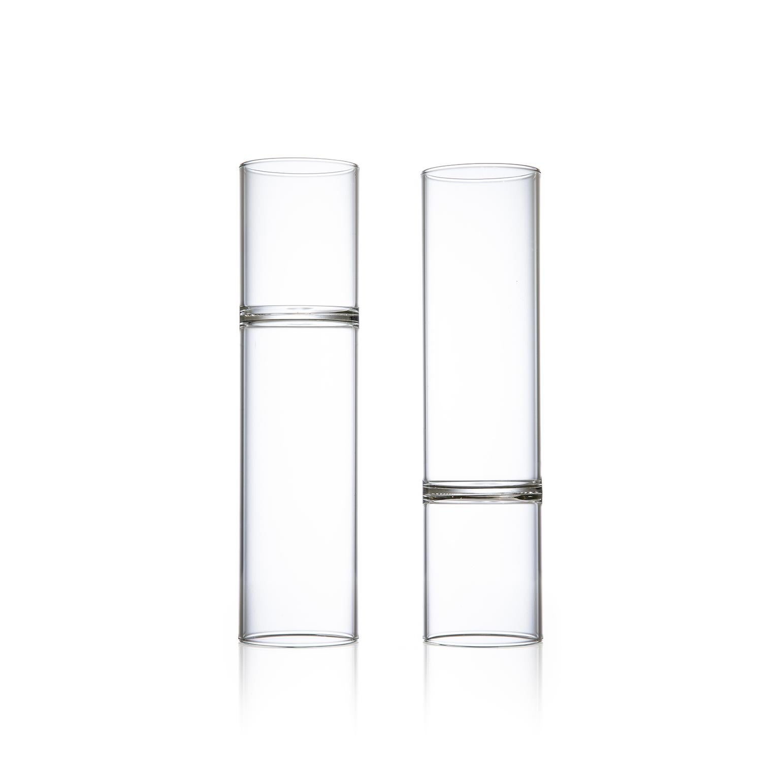 This set includes two clear minimal revolution champagne flute glasses.

Strikingly modern in form, the double ended contemporary Revolution collection is handcrafted in the Czech Republic by master glassblowers to create these champagne flutes.
