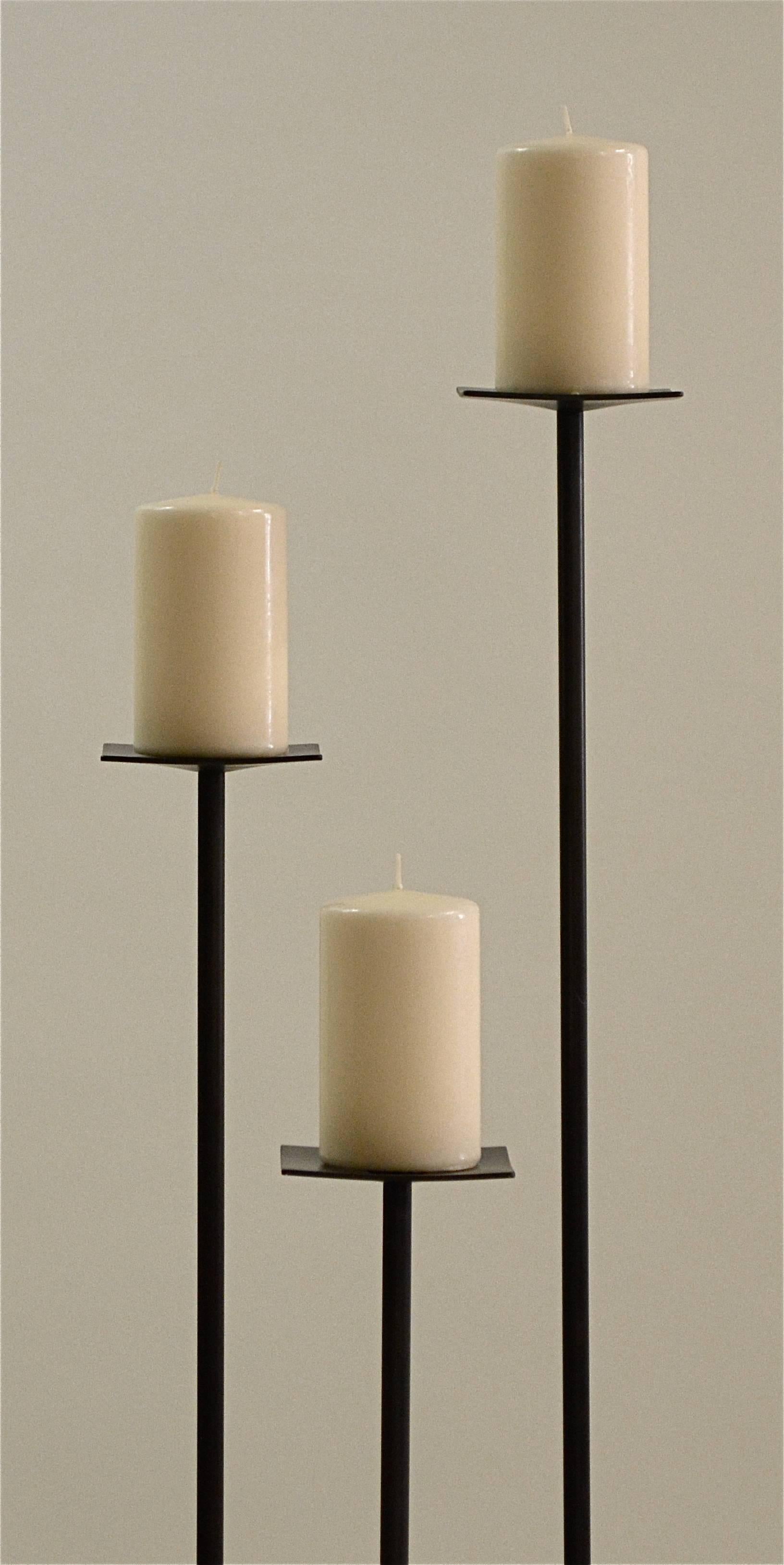 The Troika Candleholder, an original design offered exclusively by Vermontica, is designed and produced in Vermont by Scott Gordon. The troika candleholder is a trio of candleholders in varying heights of 27