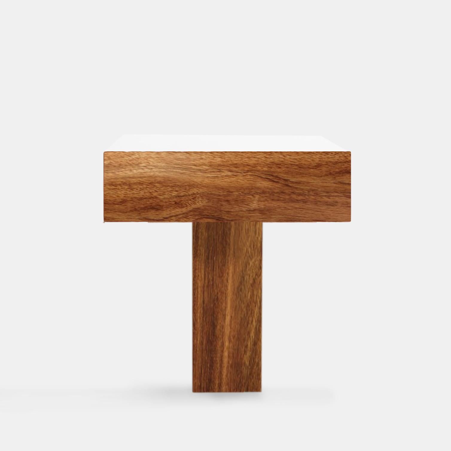 Contemporary Side Table in Brazilian wood. Natural of Brazil, Imbuia wood possesses deep, rich colors and interesting grain patterns that make every object unique. Designed with Minimalist lines and light visuals, the “Tee” side table is suitable