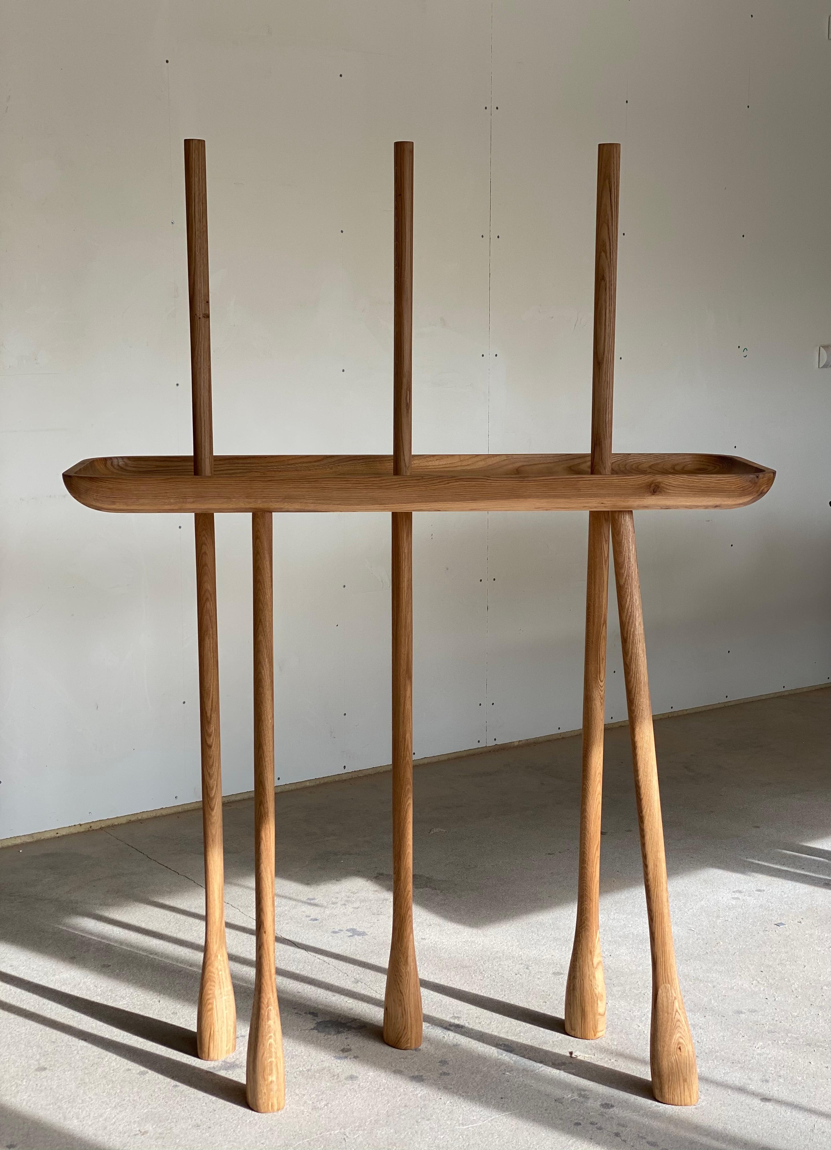 CHARLOTTE collection of collectible design objects inspired by poetic design of renowned French designer Charlotte Perriand.  Minimalistic and ironic tables and consoles are made of oiled warm oak wood. 

Olga Engel: “I have always been inspired by