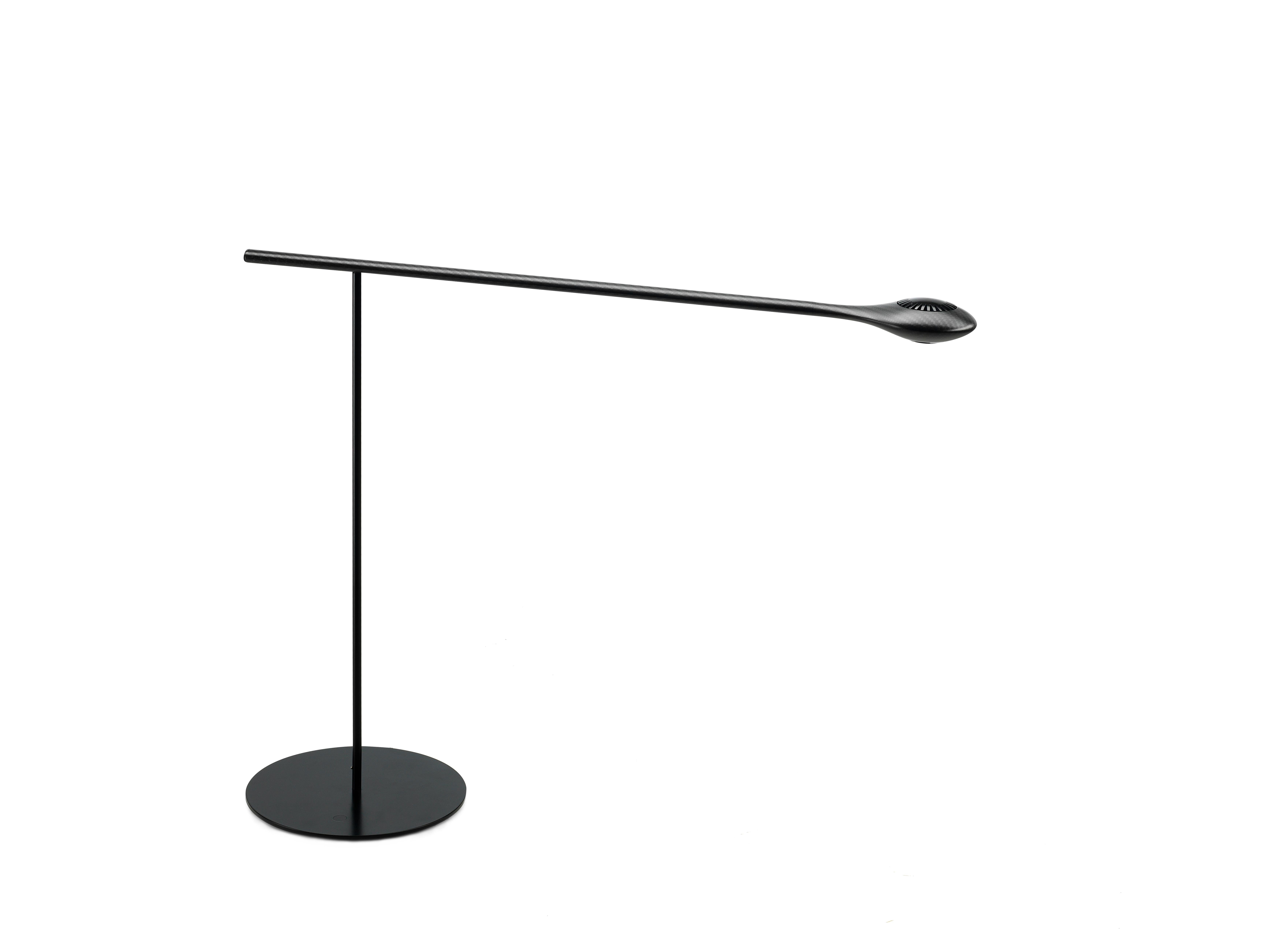 Carbon table light, a new addition to the carbon light product family, is a high-tech LED task lamp made of carbon fiber. Its sleek organic yet minimal appearance will find its place on the desktop of any serious design connoisseur.

Product