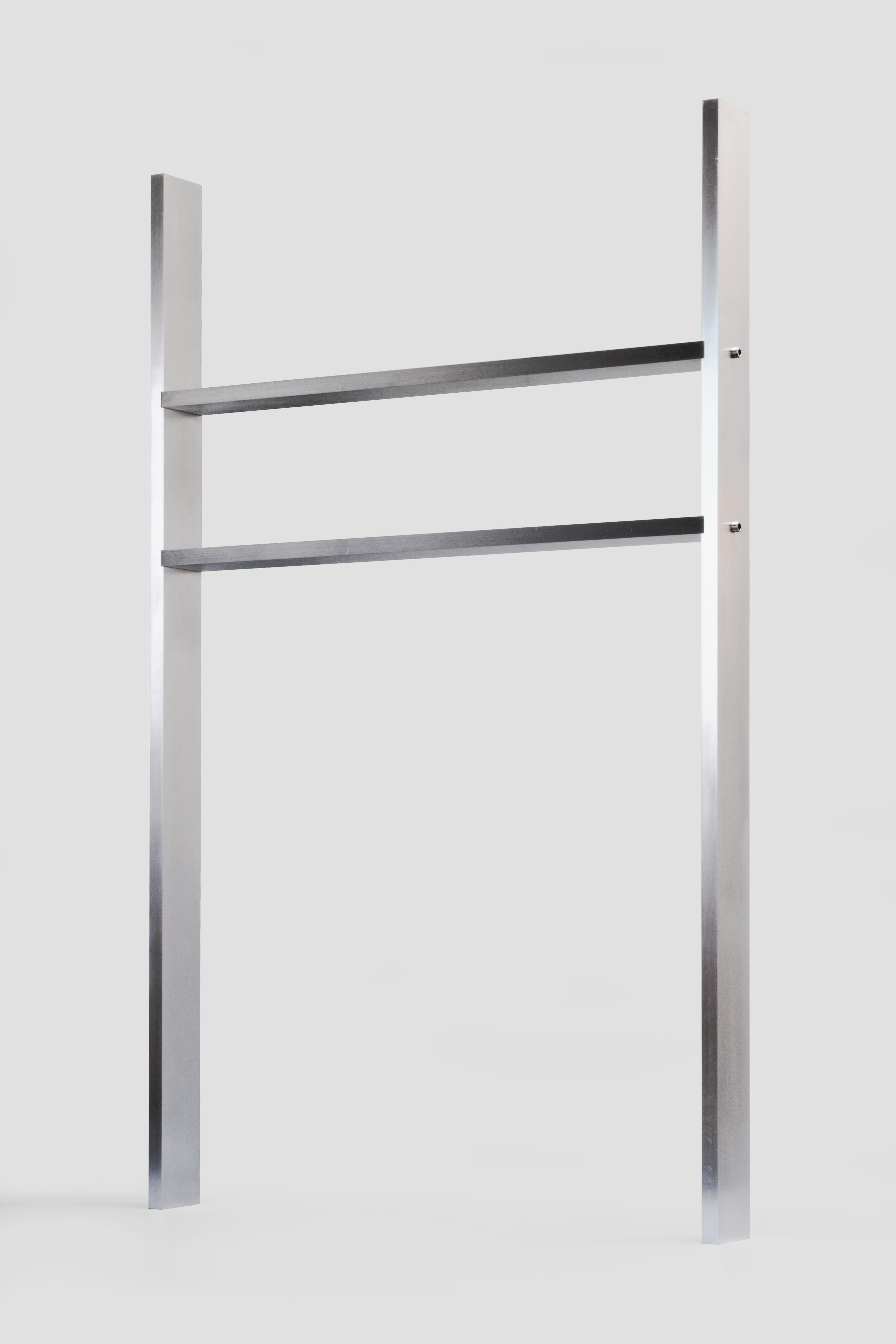 Contemporary minimalistic shelf in waxed aluminum by Johan Viladrich
Shelf
Brushed and waxed aluminum
Measures: H190, L115, W12
Apprx. 60kg
Limited Edition of 4 + 1AP

It is a sculptural composition made of four brushed aluminum profiles