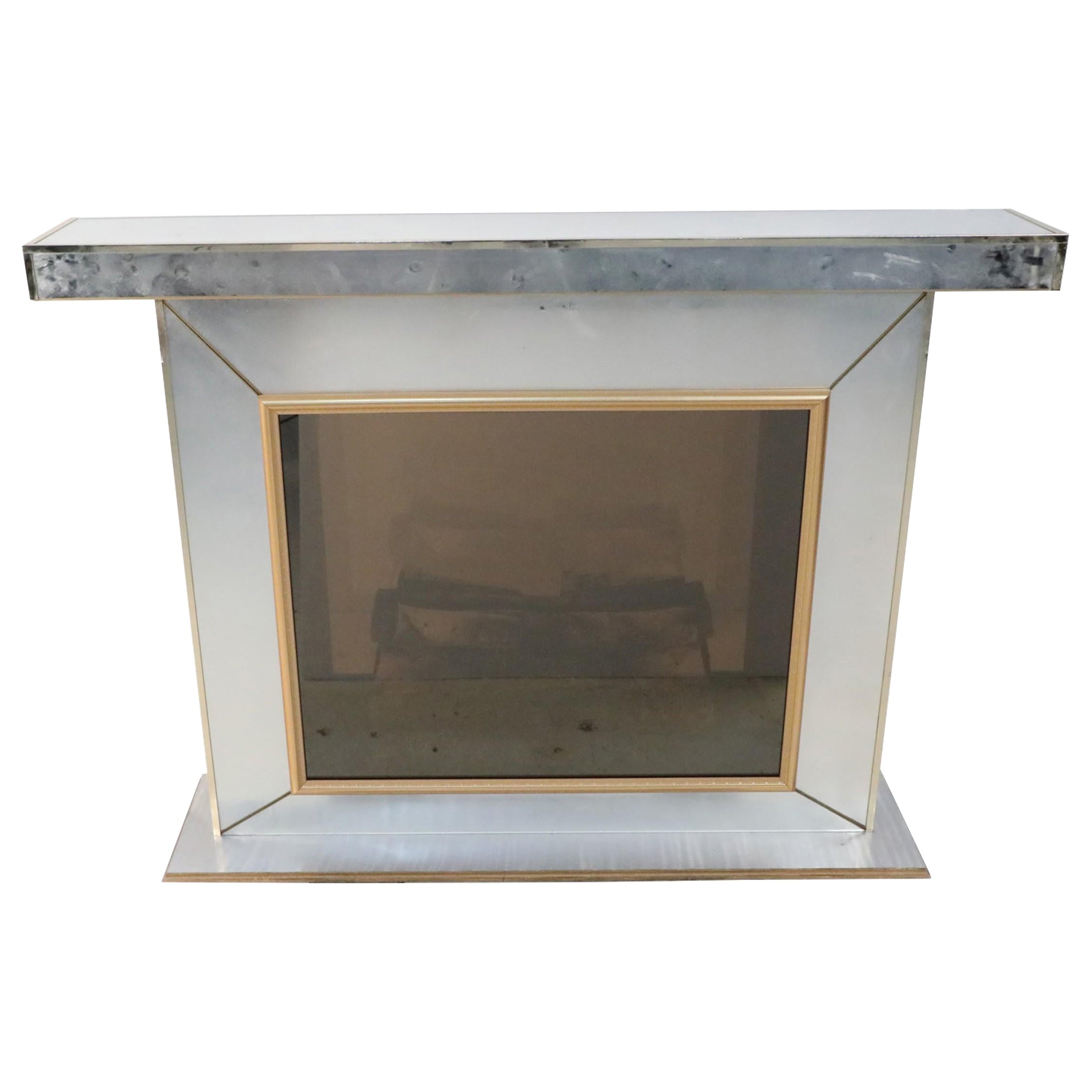 Contemporary Mirror and Gilt Metal Fireplace with Infinity Mirror Interior For Sale