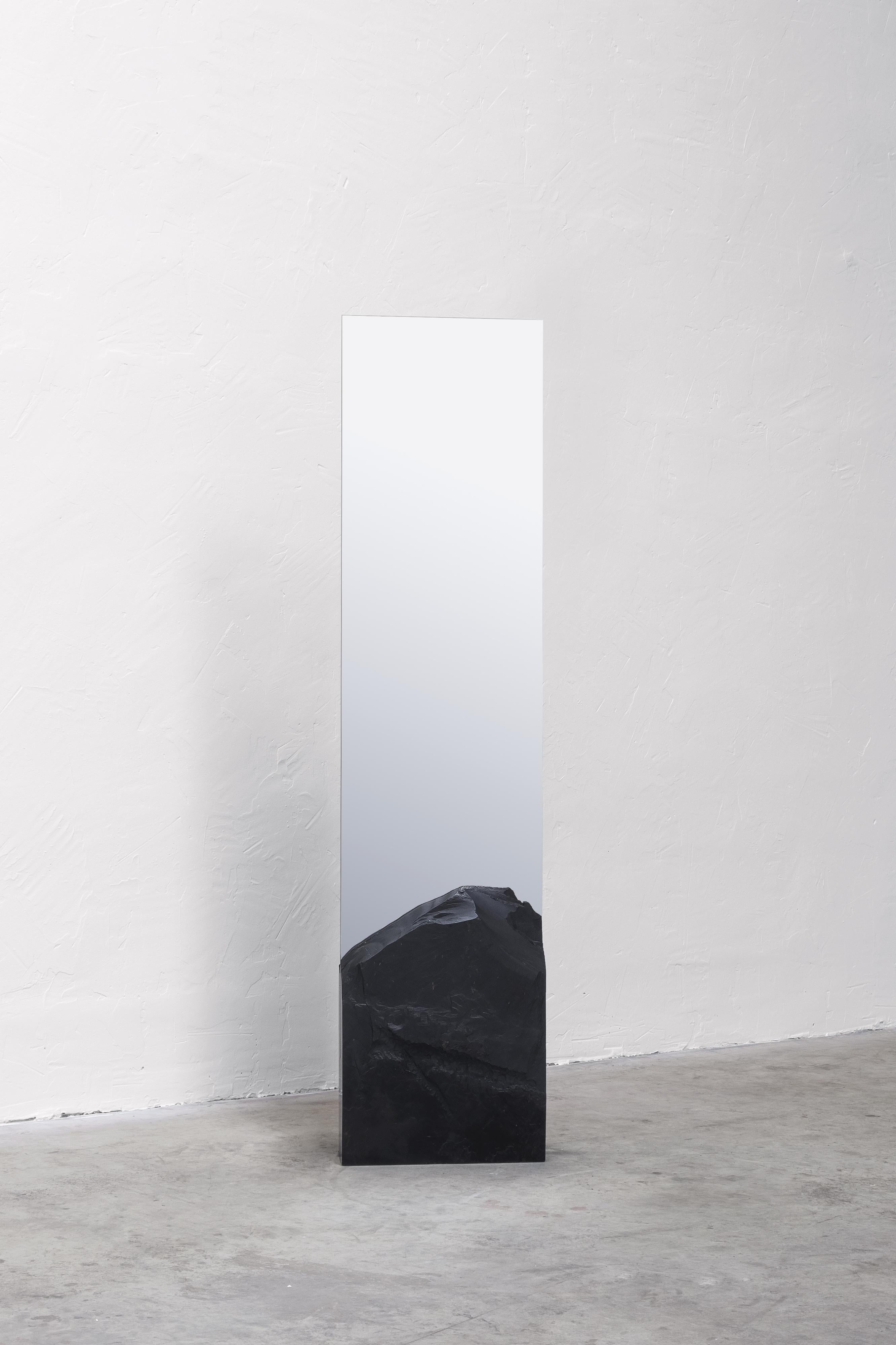 Farouche Mirror by Frédéric Saulou 
Mirror with a black slate base, 2020

Dimensions: H.200 x 45 x 16 cm

“Domestiquer” (Domesticate) is a project that aims to reintegrate heritage with the author’s design process, fuelled by encounters of creative