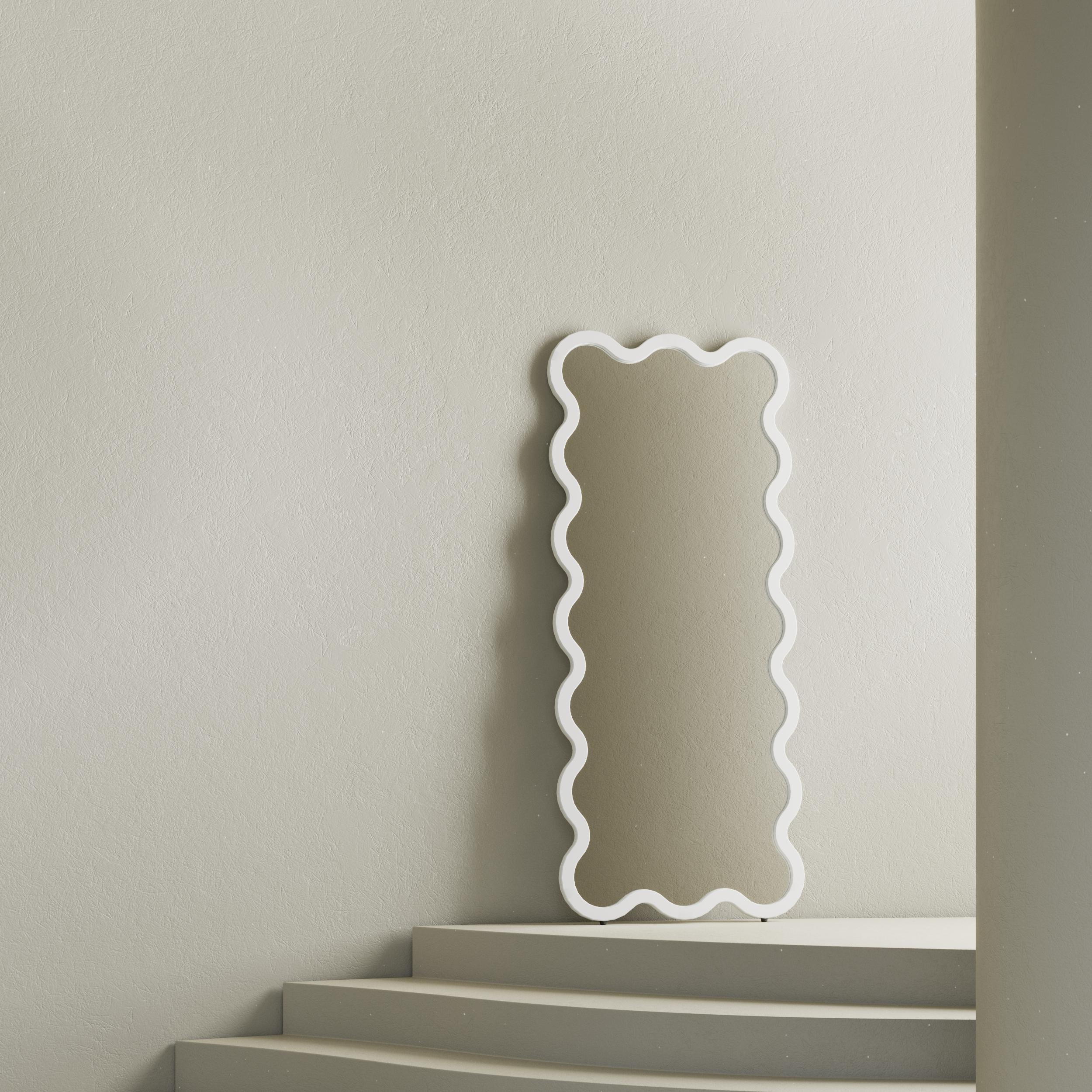 pink and white wavy mirror