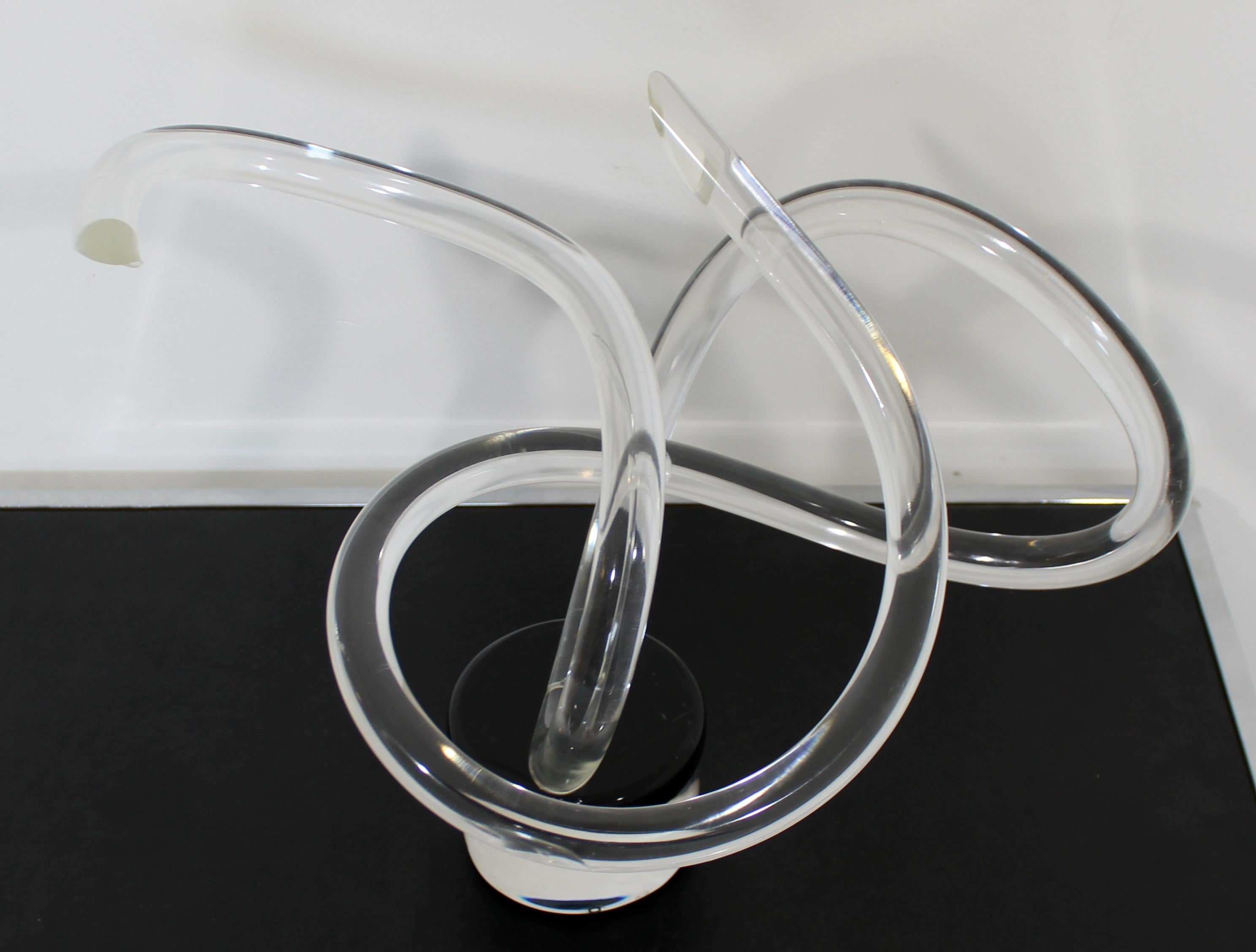 For your consideration is a stunning, abstract table sculpture, made of clear Lucite, signed by Van Teal, circa 1980s. In excellent condition. The dimensions are 19