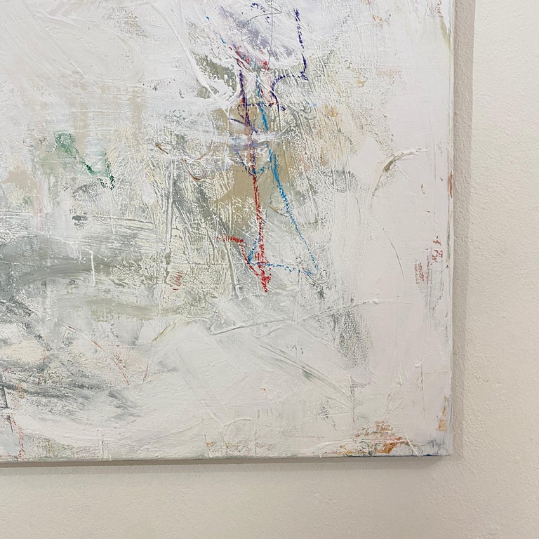 This large painting has heavily textured acrylics in shades of greys and white on canvas.
The artist created the piece using multiple techniques like pallet knife, brush and chalk. The black lines are done with chalk. The painting would complement