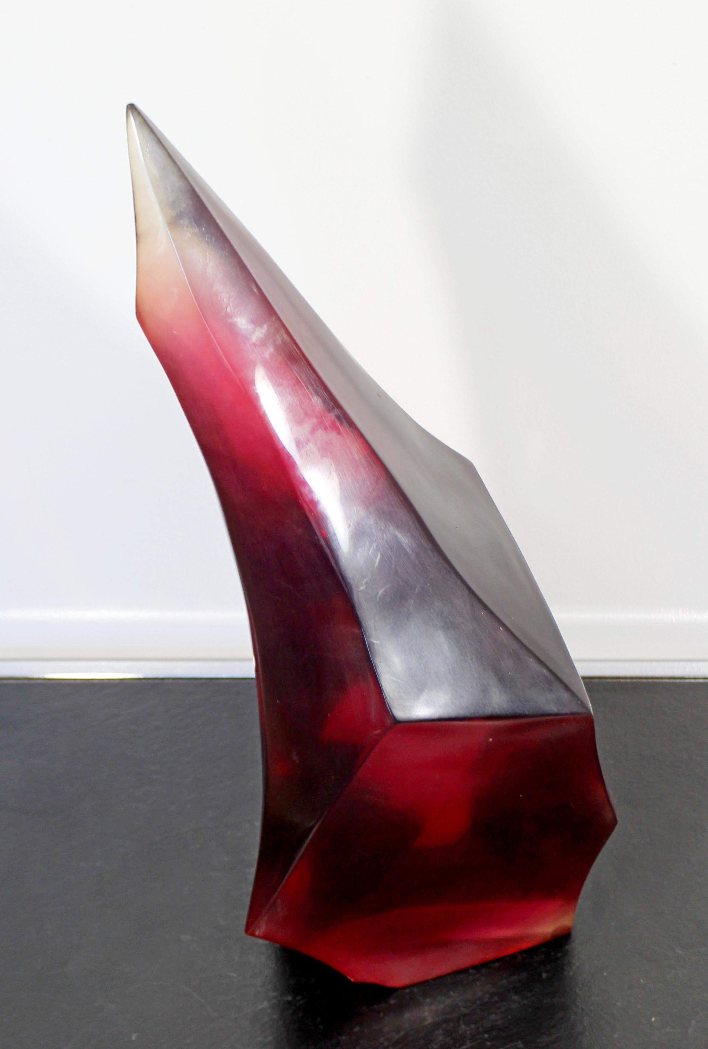 For your consideration is a fabulous, abstract table sculpture, made of red acrylic or Lucite, in the style of Van Teal, circa 1970s or 1980s. In very good vintage condition, with a chip in the base that is shown in the pictures. The dimensions are