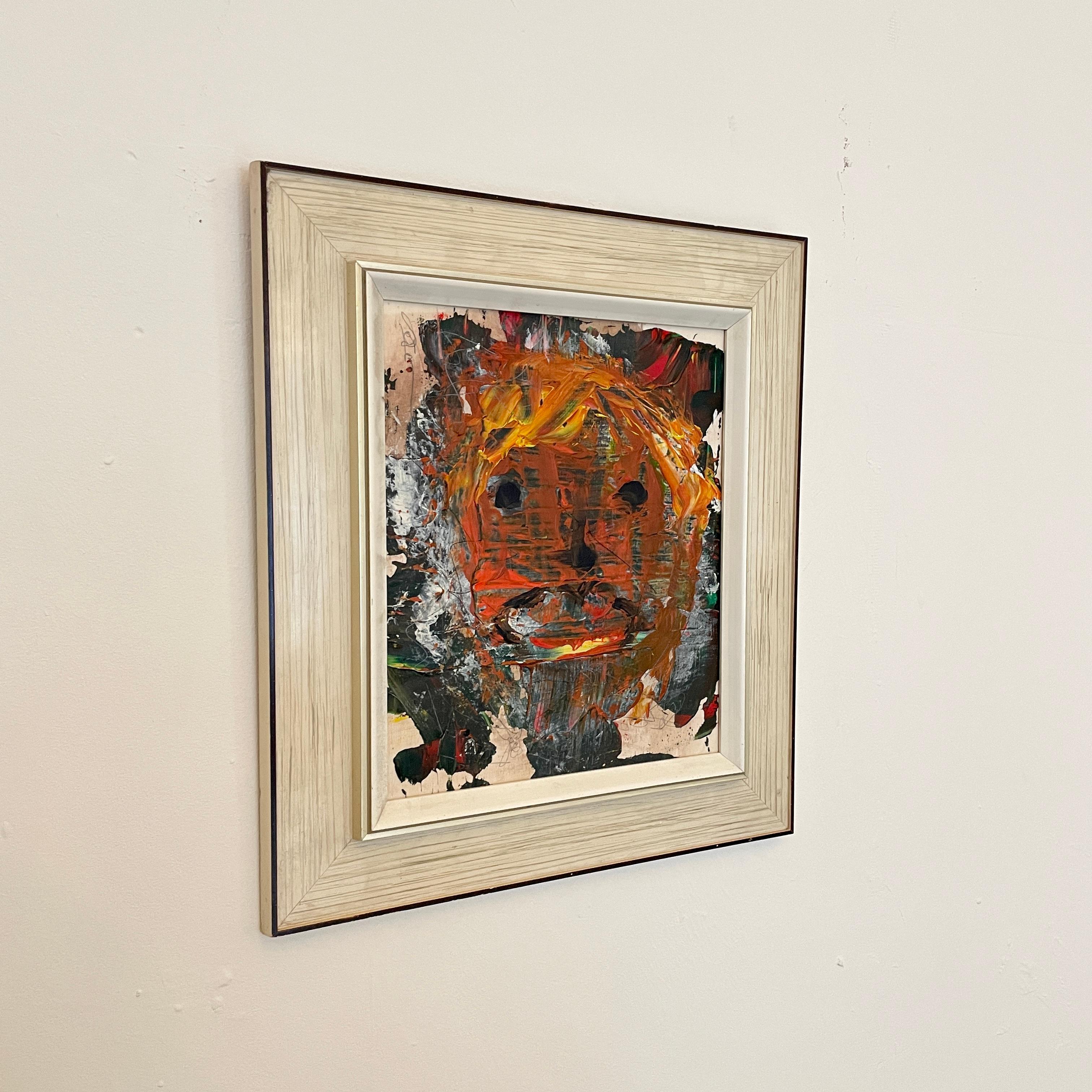 This painting has heavily textured acrylics in multicolored on wood. 
The artist created the piece using multiple techniques like palet knife, brush and pencil. 
It is framed in a mid century frame from the 1970s.
The series is called Faces. There