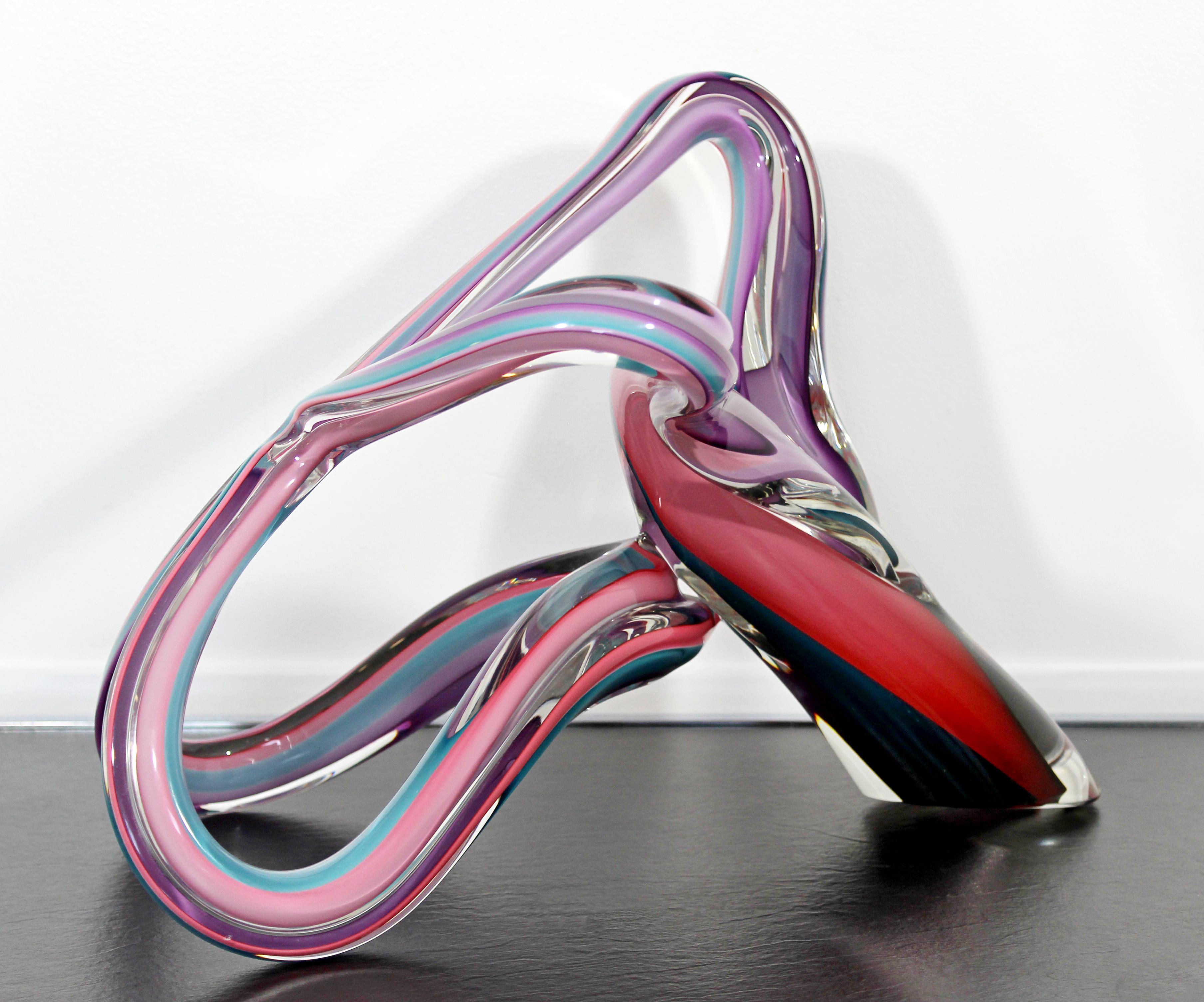 For your consideration is an utterly entrancing, freestanding, abstract glass table sculpture, signed and dated by Barry Entner, 1992. In excellent condition. The dimensions are 14