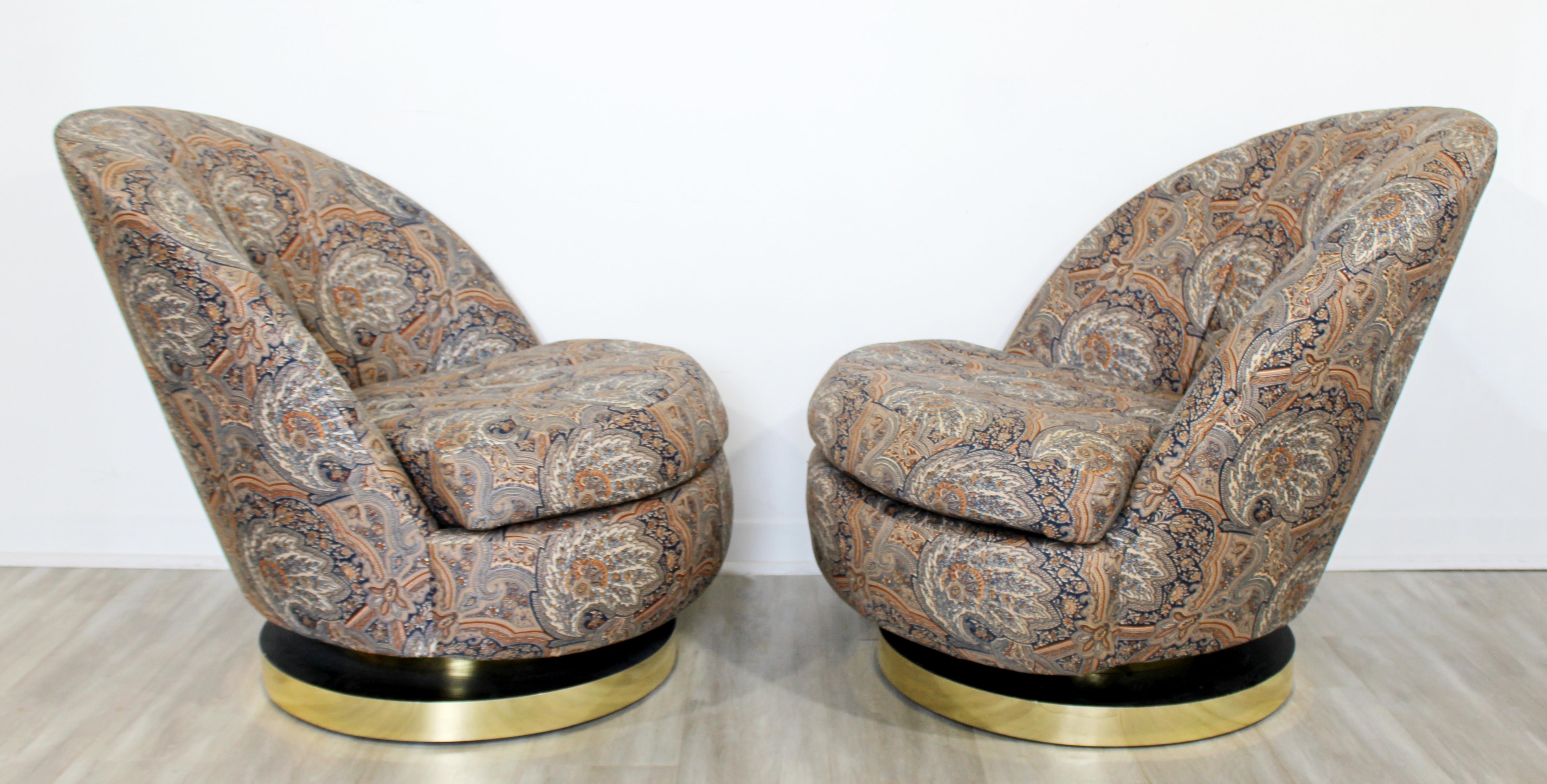 For your consideration is a stupendous pair of curved, swivel, lounge chairs, on brass bases, by Milo Baughman for Thayer Coggin, circa the 1980s. In excellent vintage condition. The dimensions of each are 29