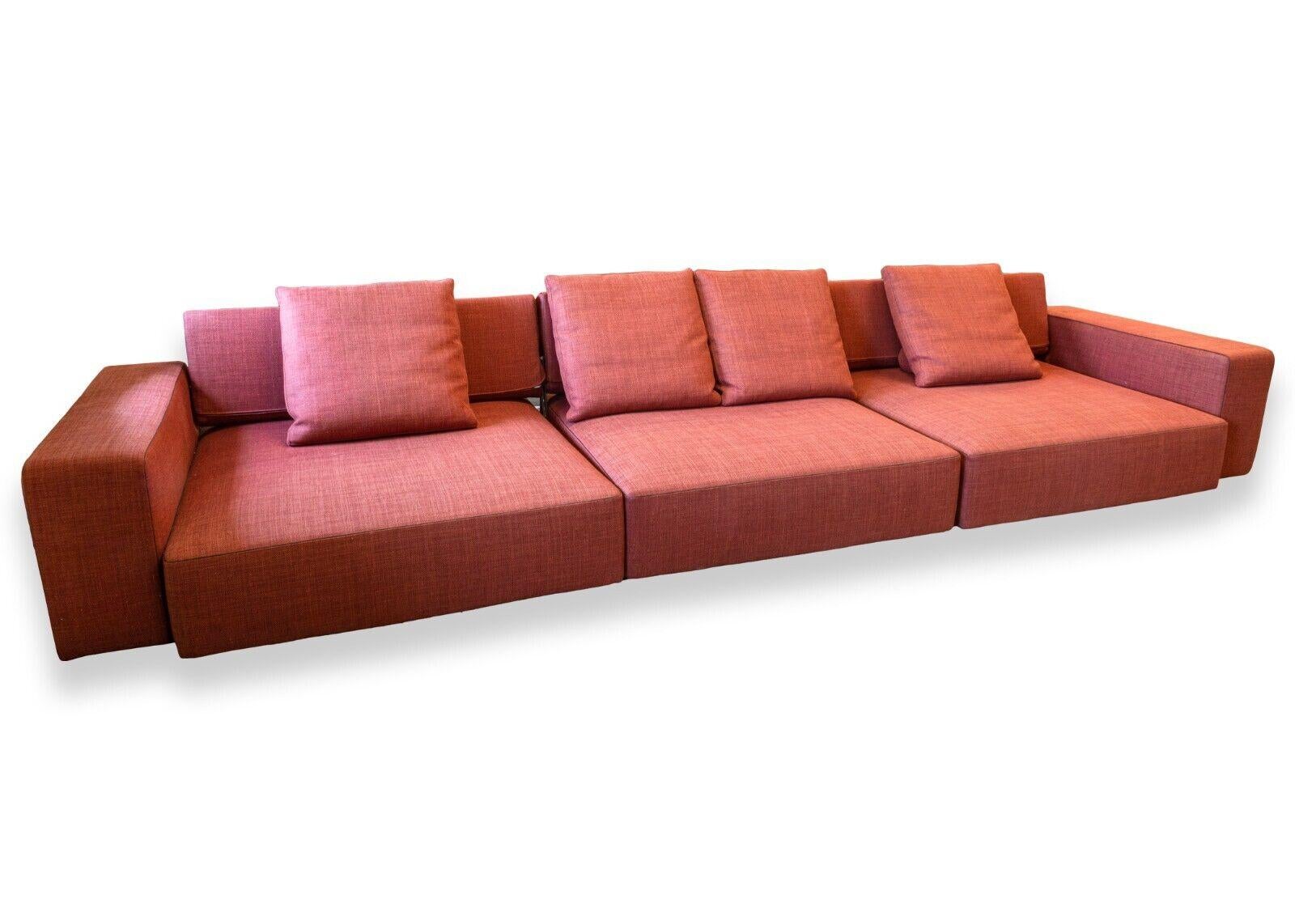 A B&B Italia Andy sofa sectional. This wonderful sectional sofa features a three piece design. The secitions of the sofa are unattatched. The unique design of the Andy sofa is its flip back cushions and pull out seats as pictured above. This sofa is