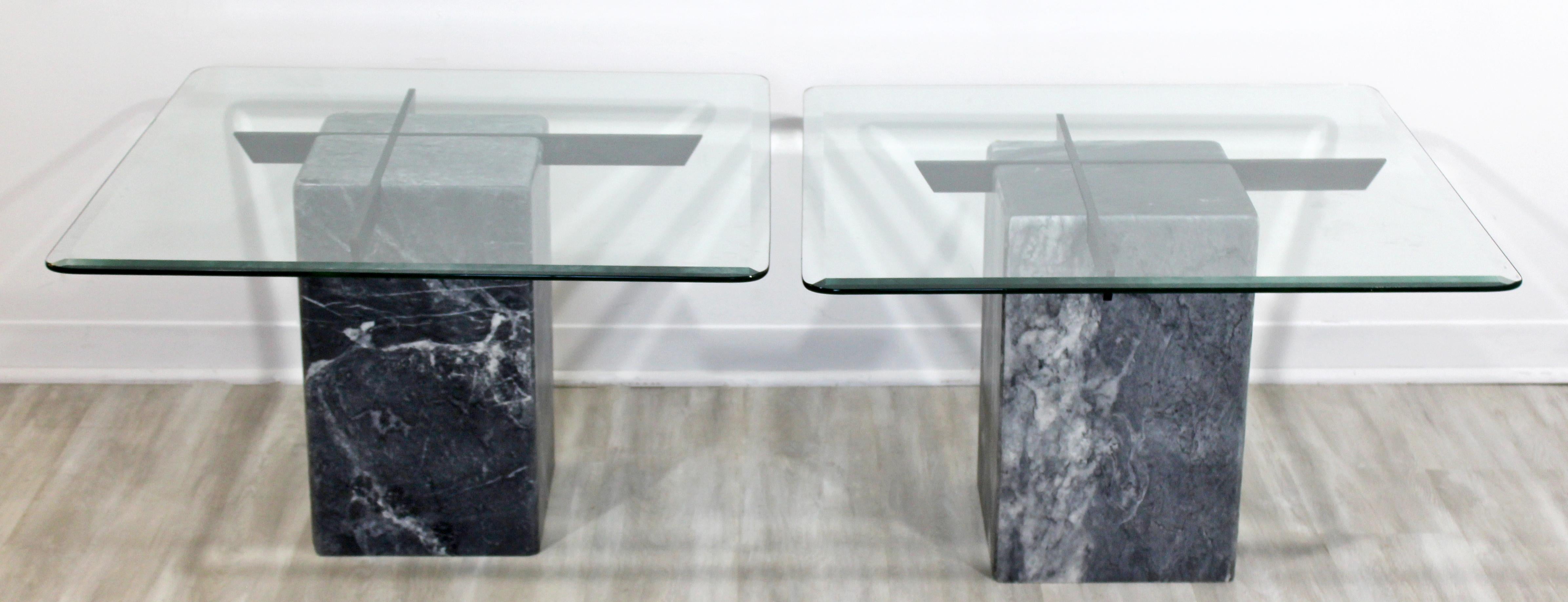 For your consideration is a pair of incredible, glass topped, marble side or end tables, made in Denmark, by Bendixen Designs, circa 1980s. In the style of Artedi. In excellent vintage condition. The dimensions are 31.5