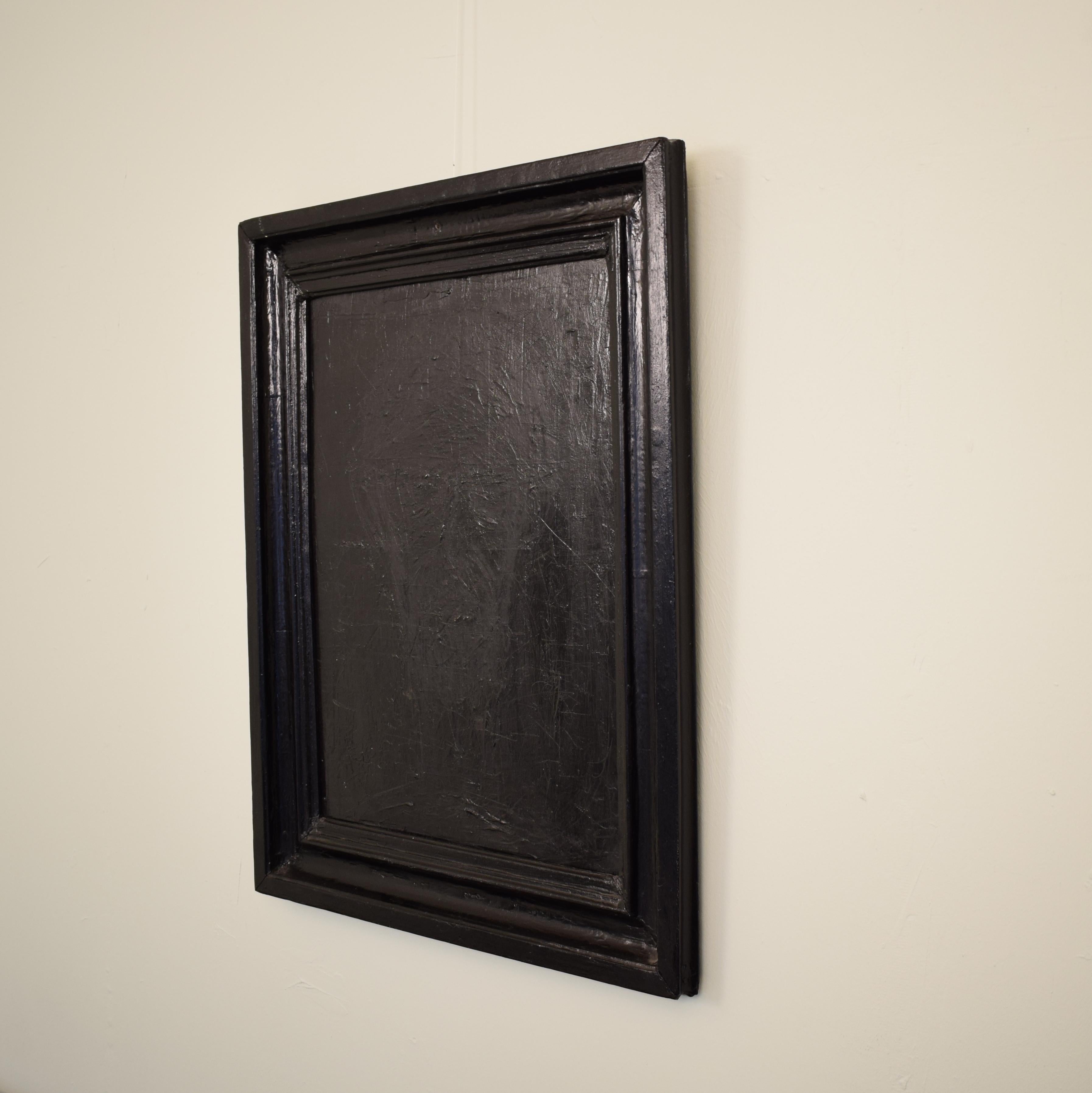This black painting has heavily textured acrylics on canvas.
The artist created the piece using multiple techniques like palet knife, brush and chalk.
It is in an old 19th century picture frame.
The painting would complement a modern interior design
