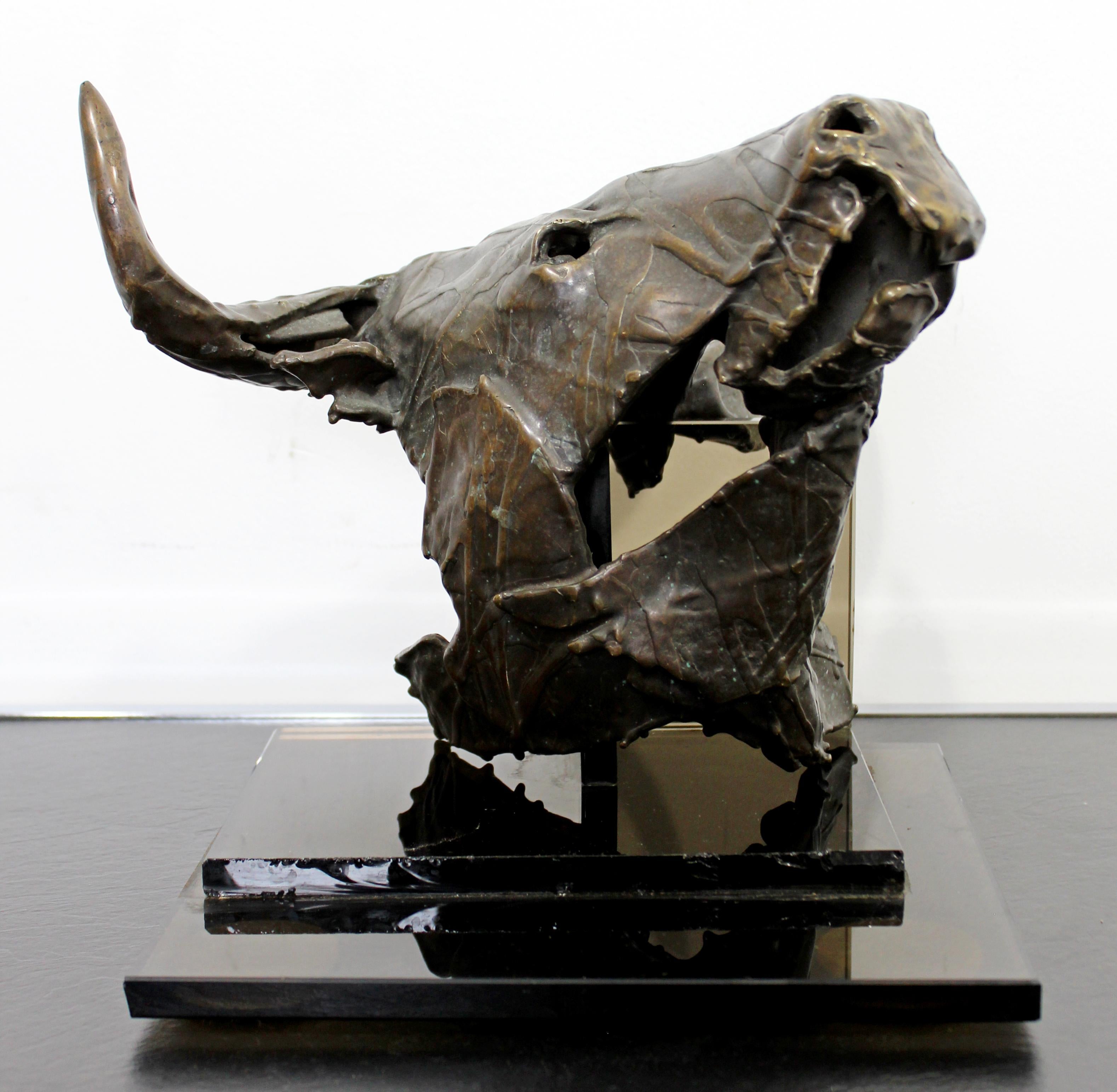 For your consideration is a gorgeous, bronze table sculpture, of a steer's head, signed by Gordon Hipp, dated 1994. In excellent condition, but the glass stand has chips. The dimensions of the sculpture on the stand are 11