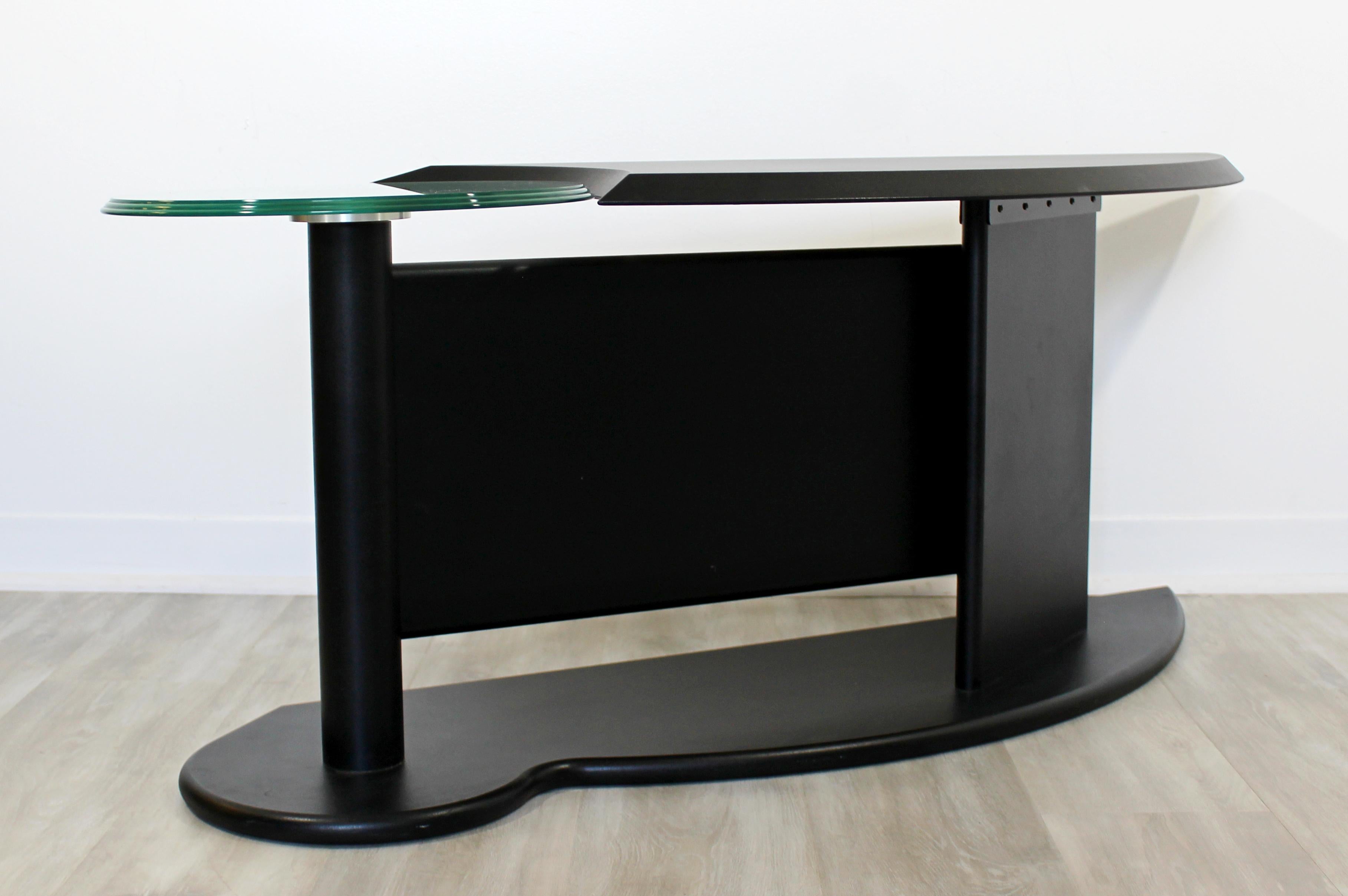 For your consideration is a marvelous, asymmetrical, glass topped, low console or accent table by Cassina Italy. In very good condition. The dimensions are 52.5