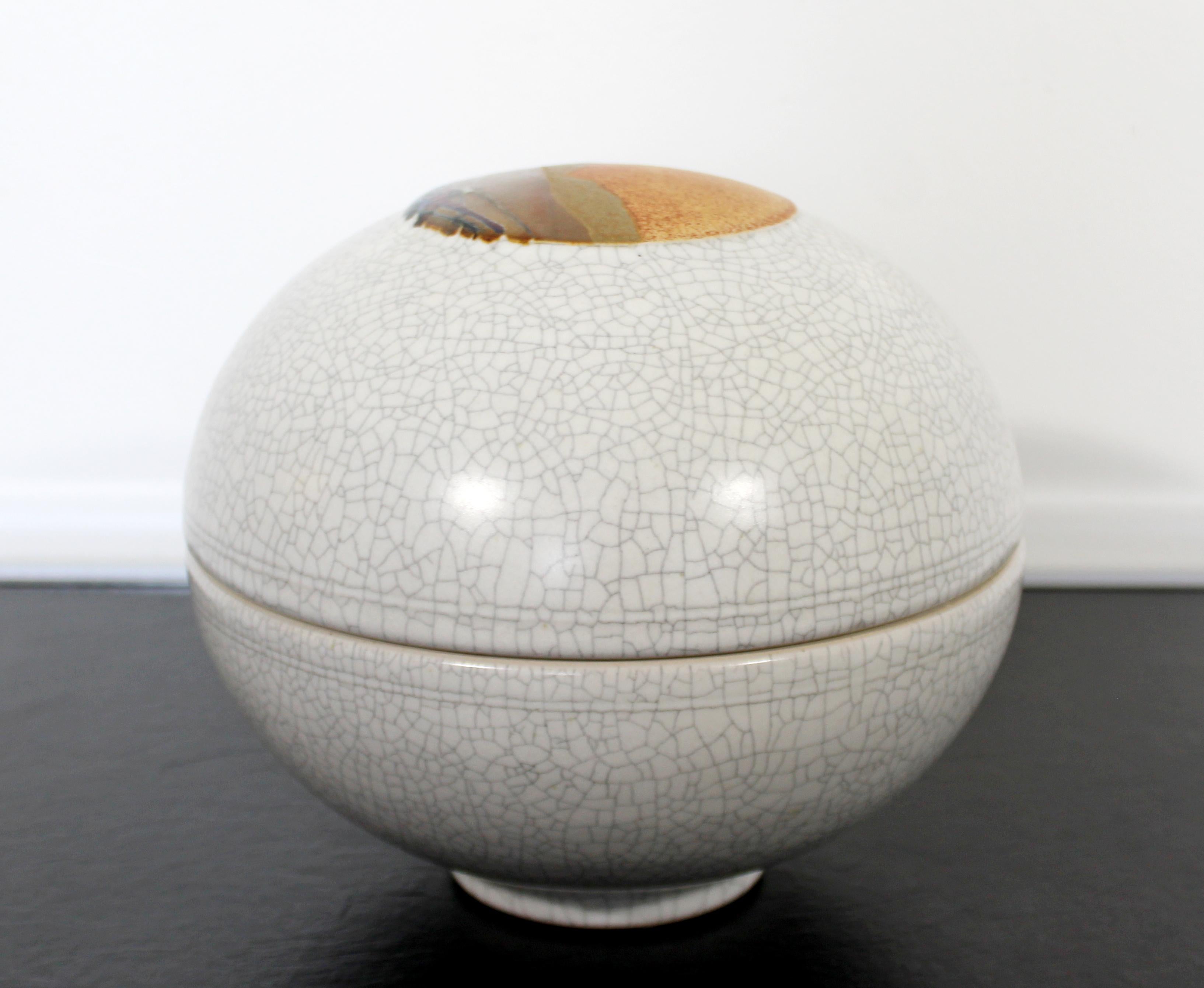 For your consideration is a stunning, ceramic, covered art vessel, by Rob Wiedmaier. In excellent condition. The dimensions are 7.5