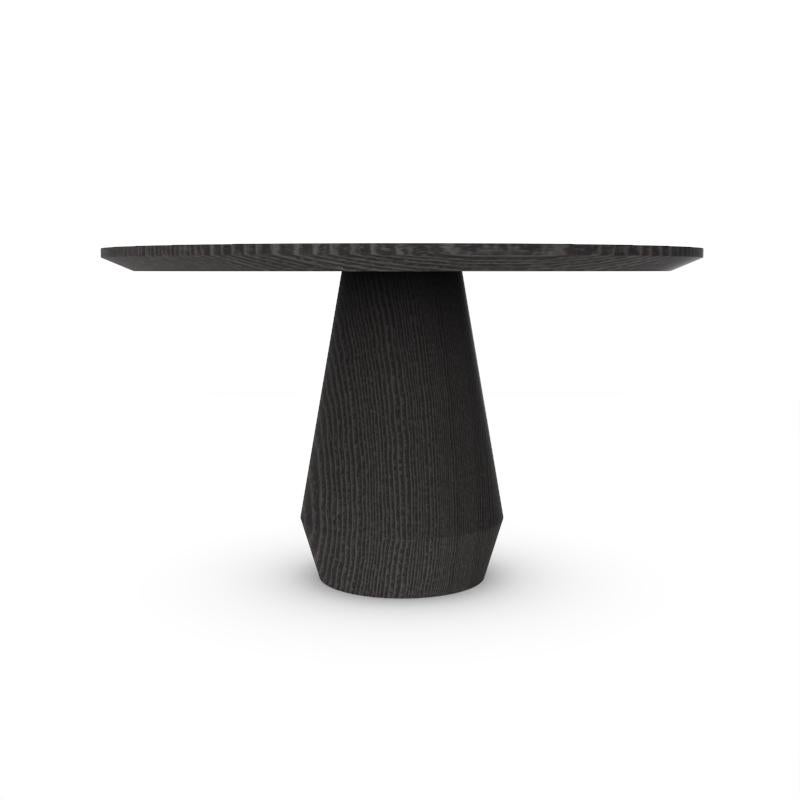 Contemporary Modern Charlotte Dining Table in Black Oak by Collector Studio

It’s as if a huge block of wood was turned on a massive lathe, making it look like its revolved shape was created by a single gesture. This wooden table will not only look