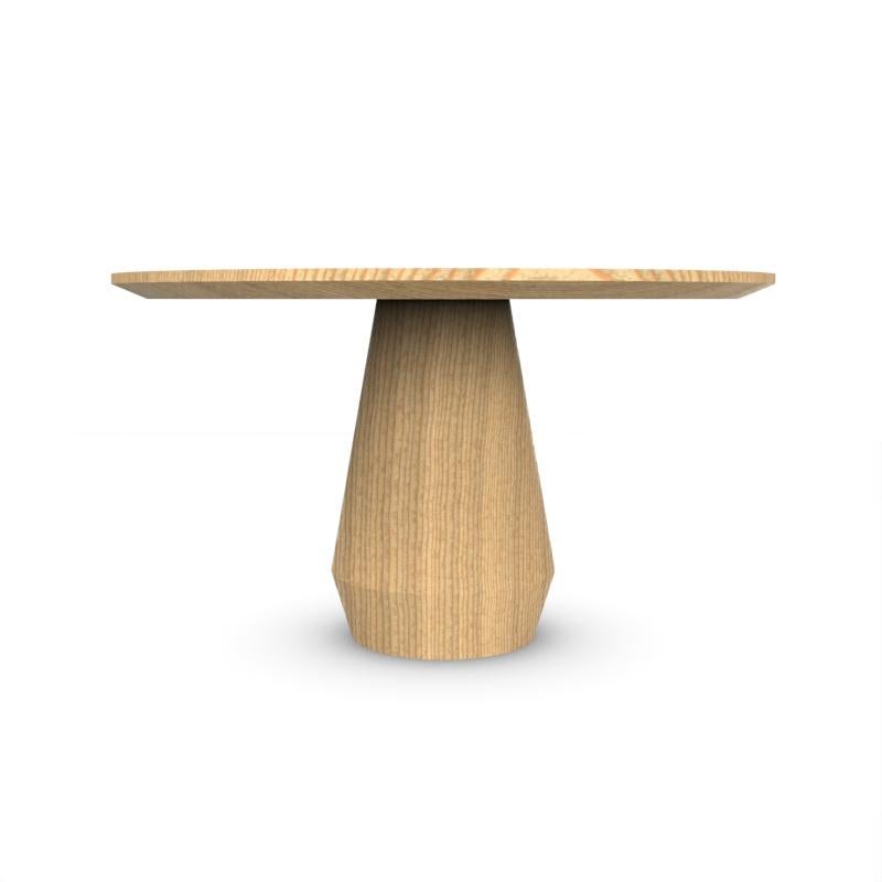 Contemporary Modern Charlotte Dining Table in Oak by Collector Studio

It’s as if a huge block of wood was turned on a massive lathe, making it look like its revolved shape was created by a single gesture. This wooden table will not only look