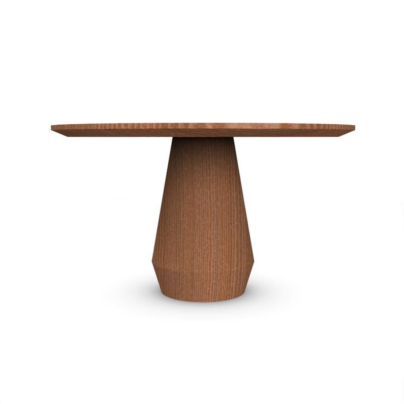 Contemporary Modern Charlotte Dining Table in Smoked Oak by Collector Studio

It’s as if a huge block of wood was turned on a massive lathe, making it look like its revolved shape was created by a single gesture. This wooden table will not only look