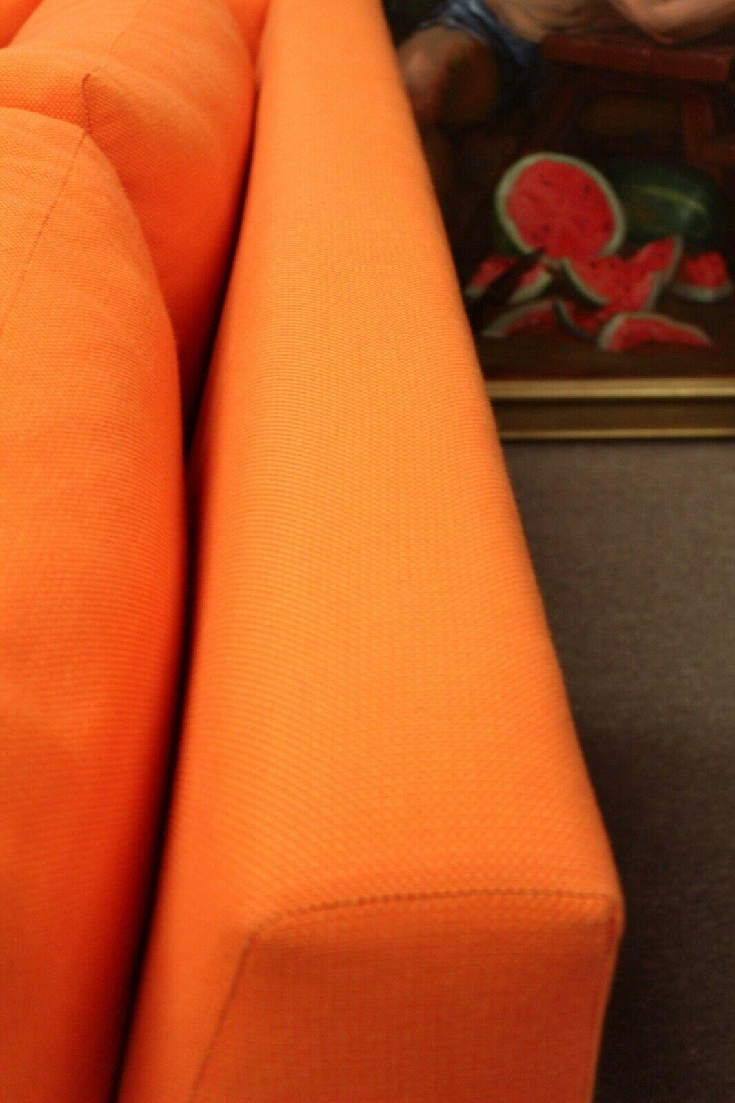 orange sofa with chaise