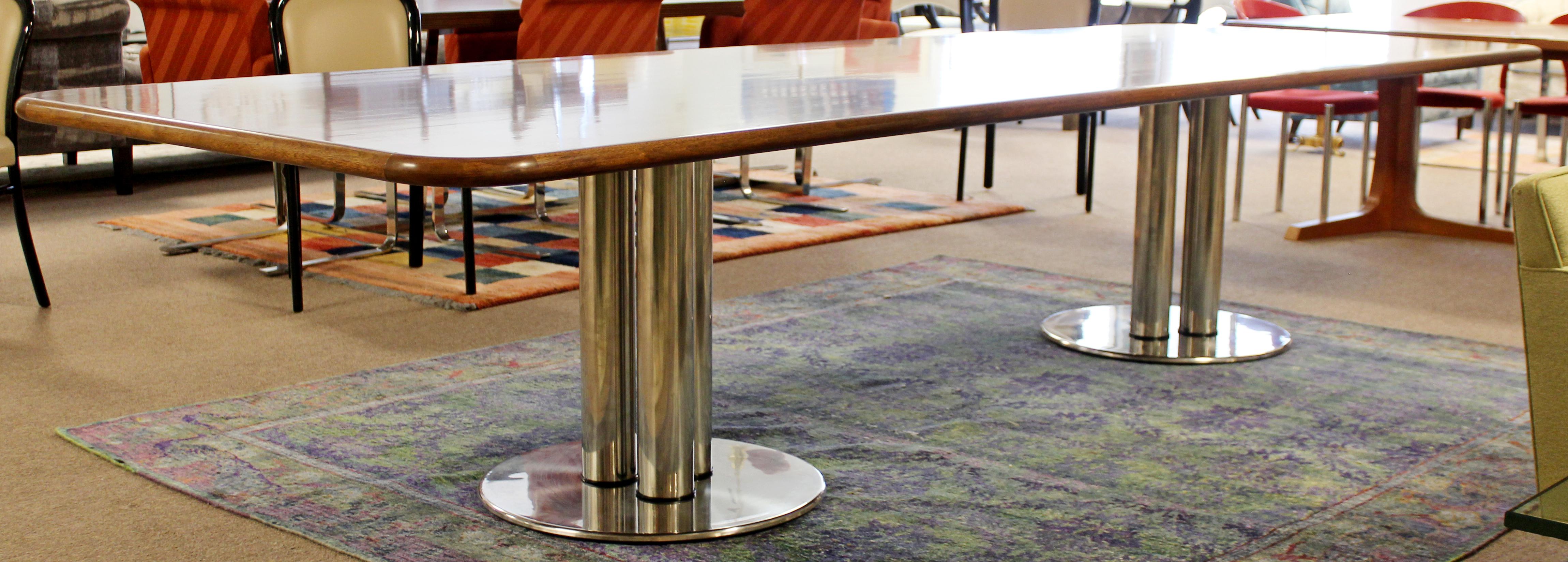 For your consideration is a marvelously massive, walnut topped conference or dining table, on a Pace style base, circa 1980s. In excellent vintage condition. The dimensions are 144