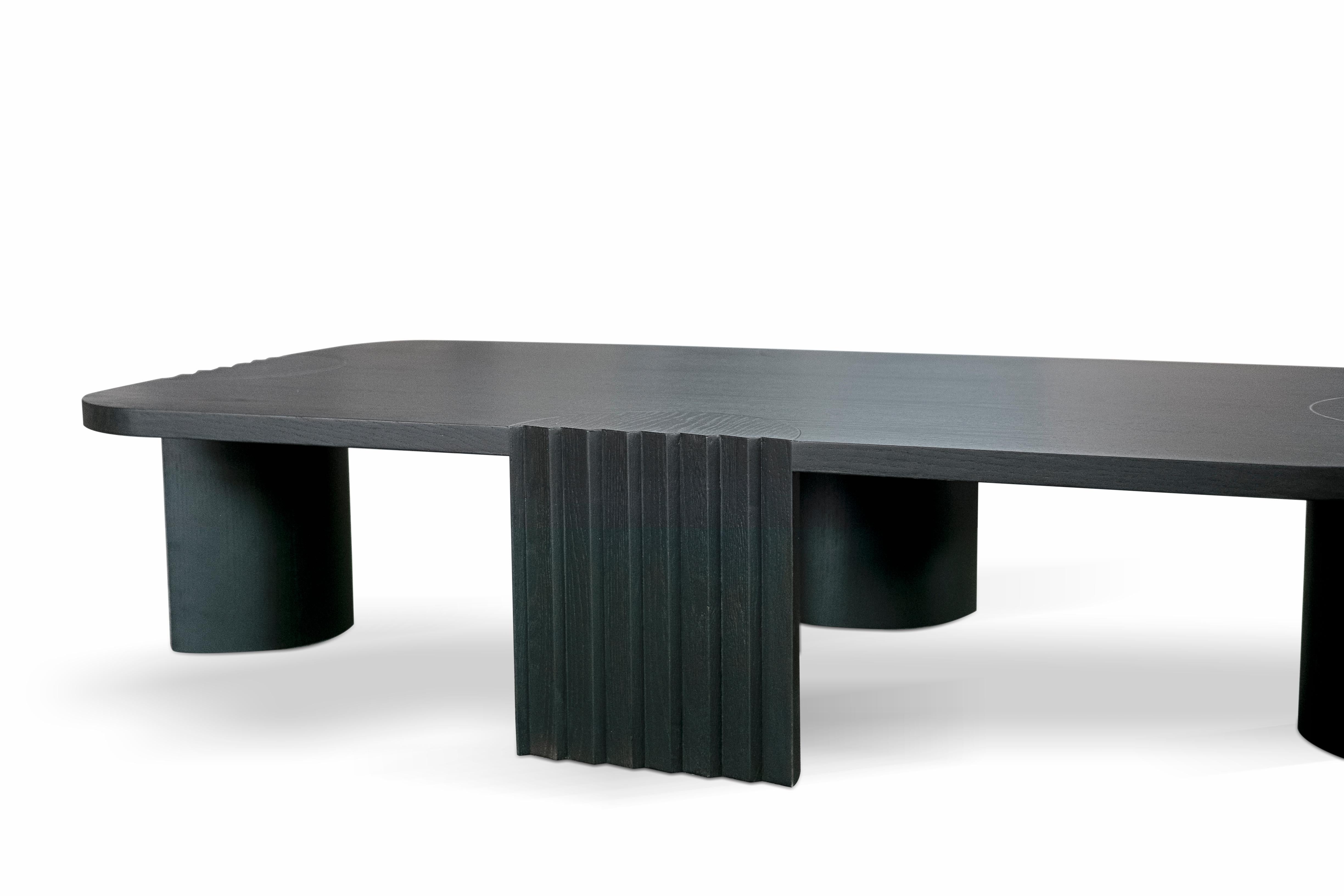 Contemporary Modern European Caravel Low Coffee Table in Black Oak by Collector

21st century Colombo, the Italian explorer, left from Portugal with 3 (as low tables are) Caravels to discover the world.
Inspired by the different materials used on
