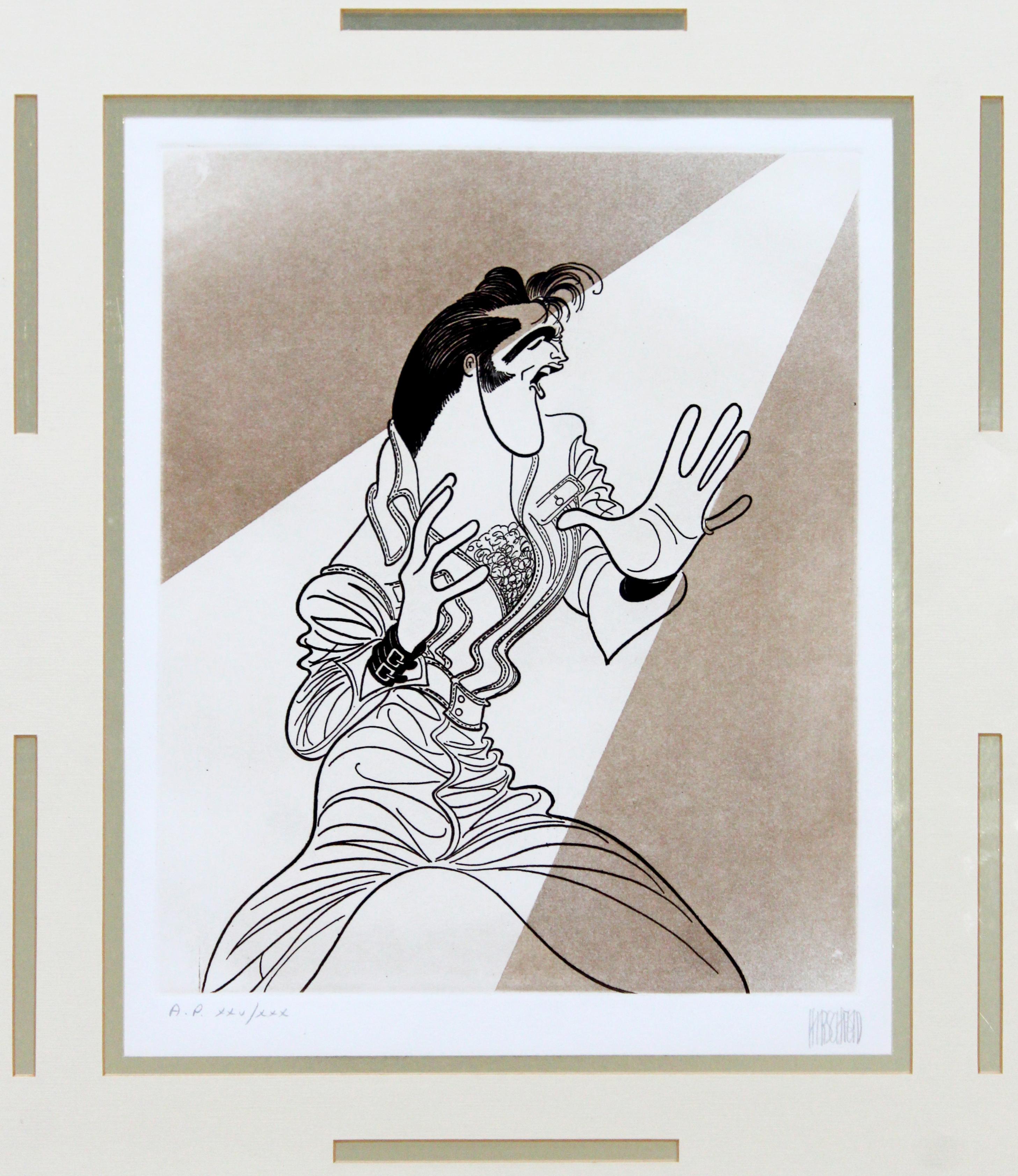 For your consideration is a framed, Elvis etching, signed and numbered by Al Hirschfield, A.P. 25/30. In excellent condition. The dimensions of the frame are 17