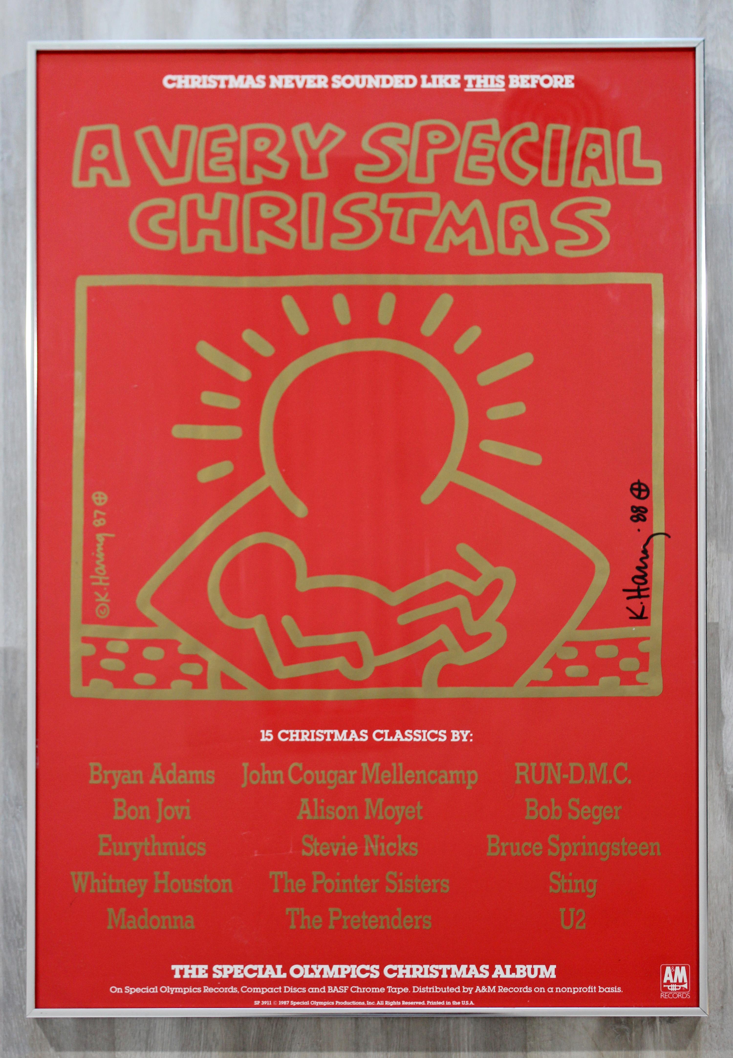 For your consideration is a gorgeous, framed offset lithograph, signed and dated by Keith Haring, 1988. This poster was the artwork for the A & M Christmas album. In excellent condition. The dimensions are 24.25