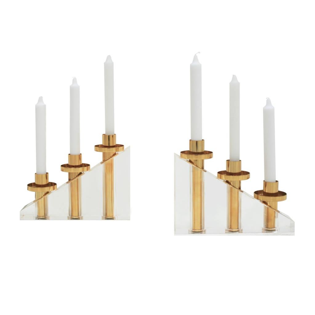 Pair of sculptural candelabra made of solid methacrylate and brass, France, 1970.