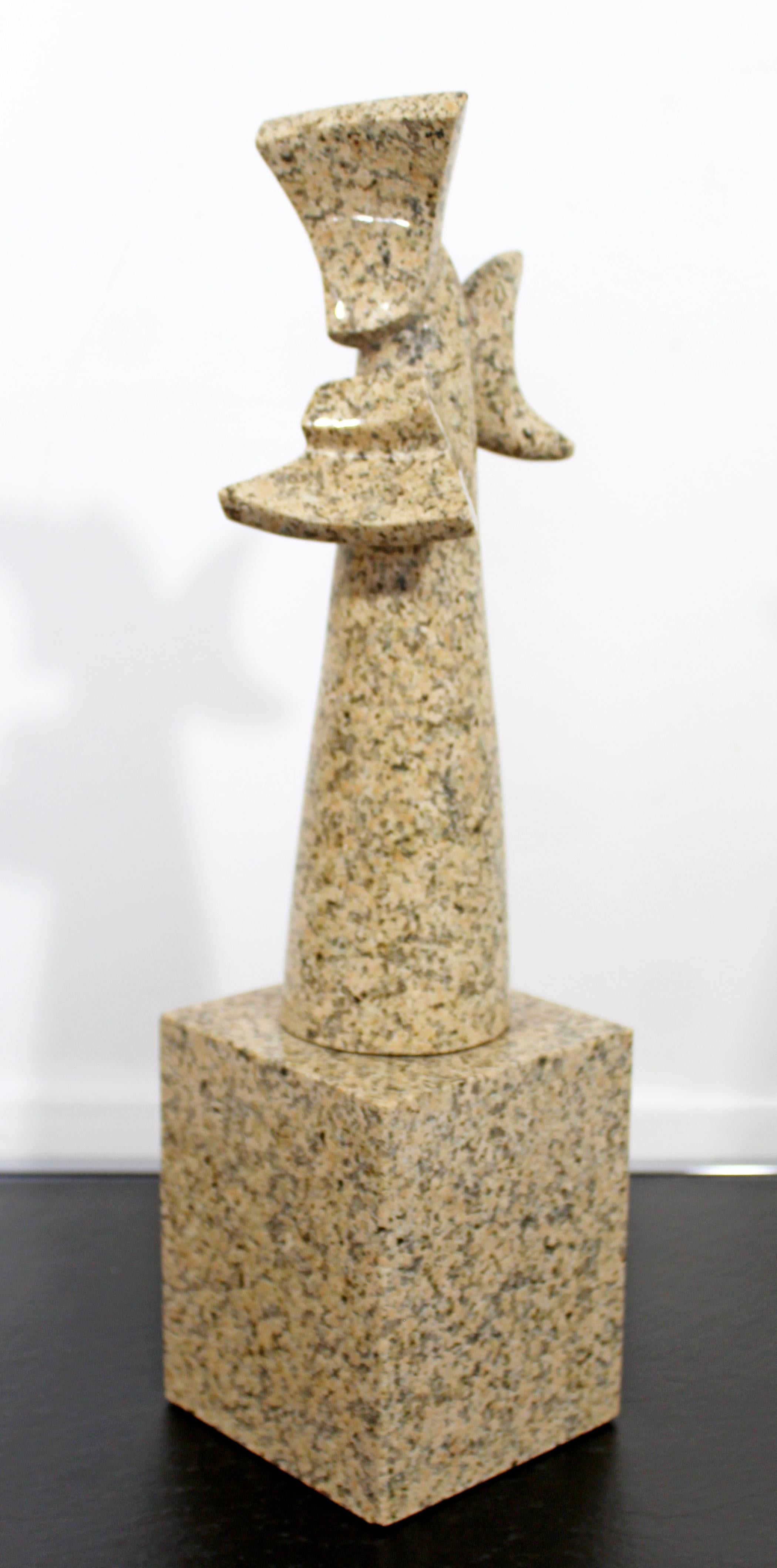 For your consideration is a unique, abstract table sculpture, made of granite. In excellent condition. The dimensions are 4.5