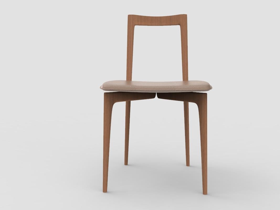 Chaise contemporaine grise en cuir Linea 611 Testa di Moro et bois par Collector Studio

Chaise de salle à manger grise - Avec sa structure légère et en bois massif, cette chaise convient aux intérieurs contemporains. Ses proportions et