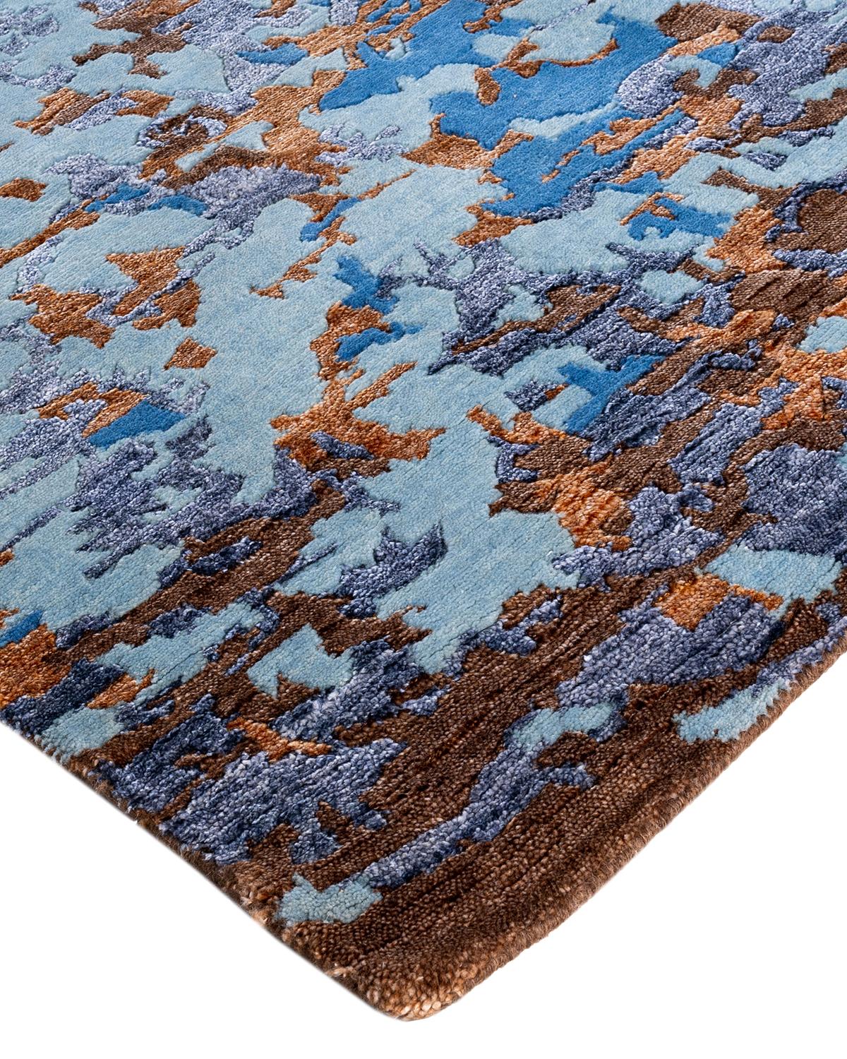 Fresh, spirited, and above all, luxurious, the rugs of the Modern collection can invigorate a traditional room as gracefully as they can ground a more contemporary space. The opulent pattern in this rug is derived from the rich tradition of Turkish