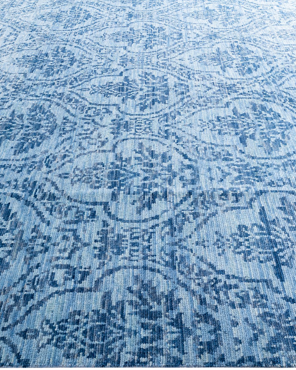 Annodato a mano Tappeto moderno e contemporaneo in lana floreale annodata a mano di colore blu 8' 1