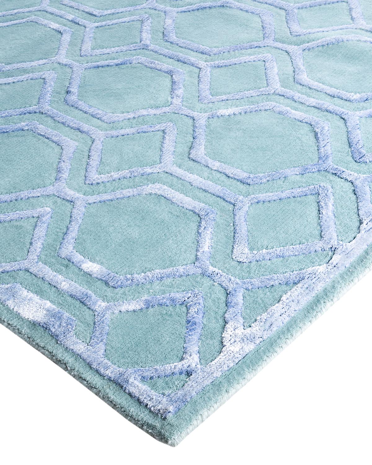 Fresh, spirited, and above all, luxurious, the rugs of the Modern collection can invigorate a traditional room as gracefully as they can ground a more contemporary space. The opulent pattern in this rug is derived from the rich tradition of Turkish