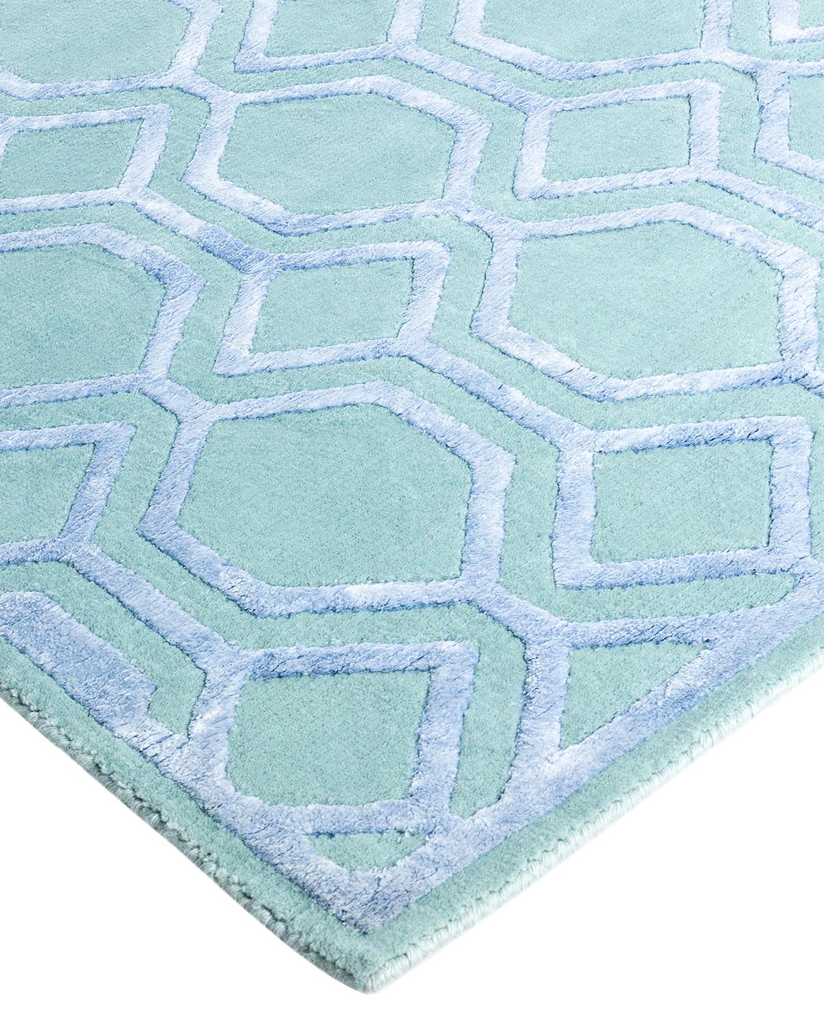 Fresh, spirited, and above all, luxurious, the rugs of the Modern collection can invigorate a traditional room as gracefully as they can ground a more contemporary space. The opulent pattern in this rug is derived from the rich tradition of Turkish