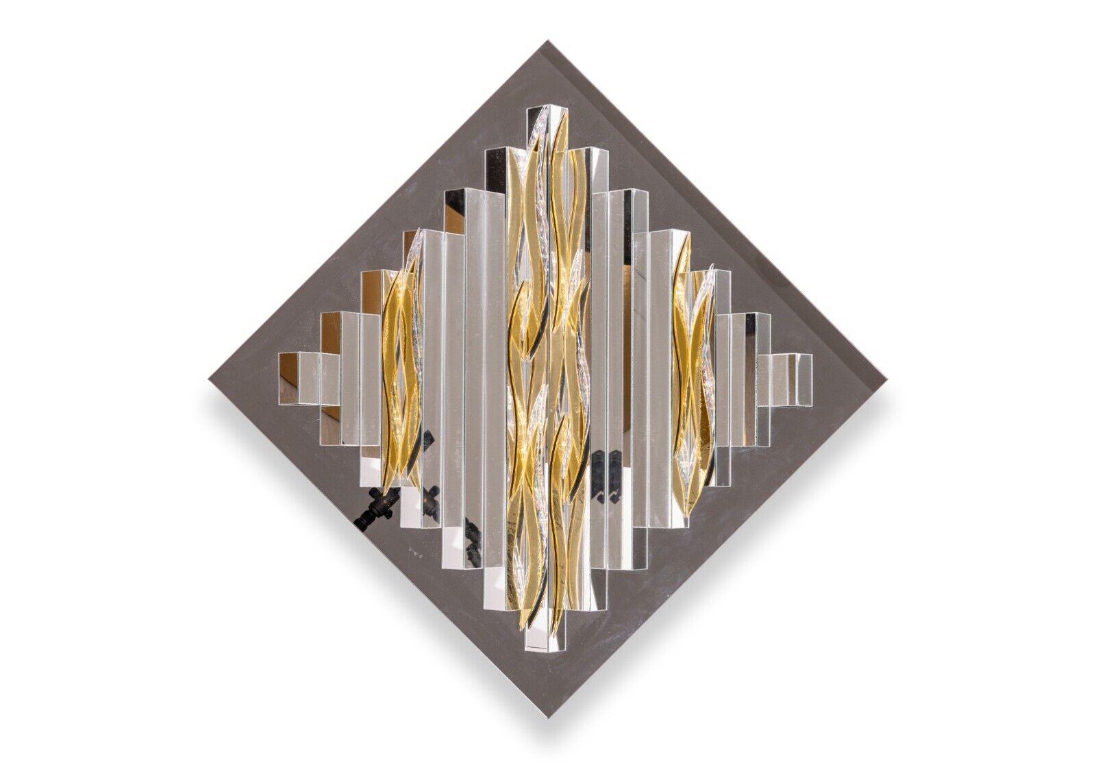 A contemporary modern Harvard Reflections sculptural mirror 1980s. A very pretty contemporary accent mirror. This square, wall mounted mirror features a gorgeous set of rectangular sculptural mirrors with abstract gold and silver acrylic accents.