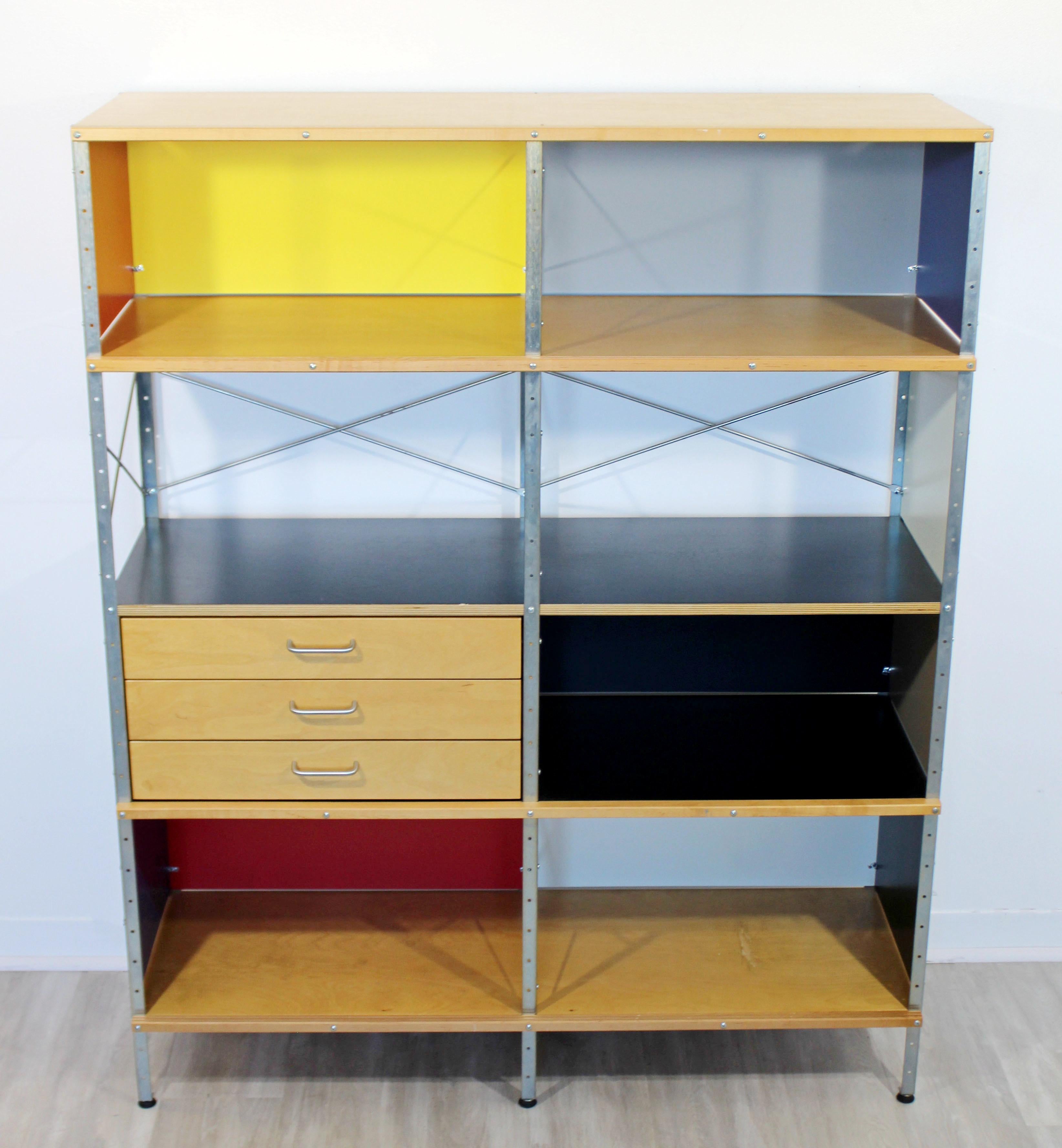 For your consideration is an incredibly fun, 4 x 2 storage shelving unit, with three drawers and seven shelves, by Herman Miller, circa 2000. In very good condition. The dimensions are 47.5