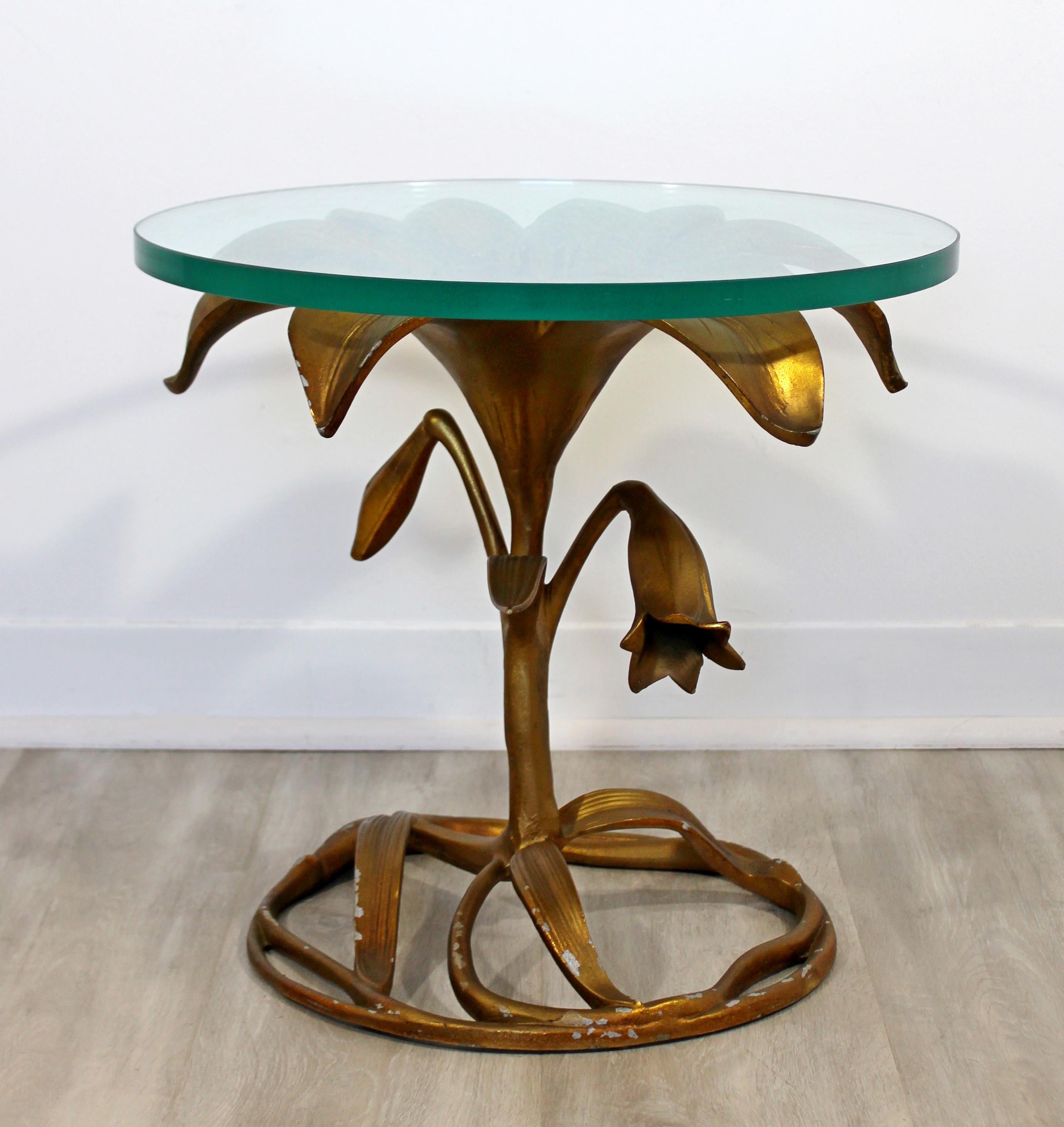 For your consideration is a stunning, Hollywood Regency flower side table, made of brass and with a glass tabletop, by Arthur Court, circa 1980s. In good vintage condition. The dimensions are 18.5