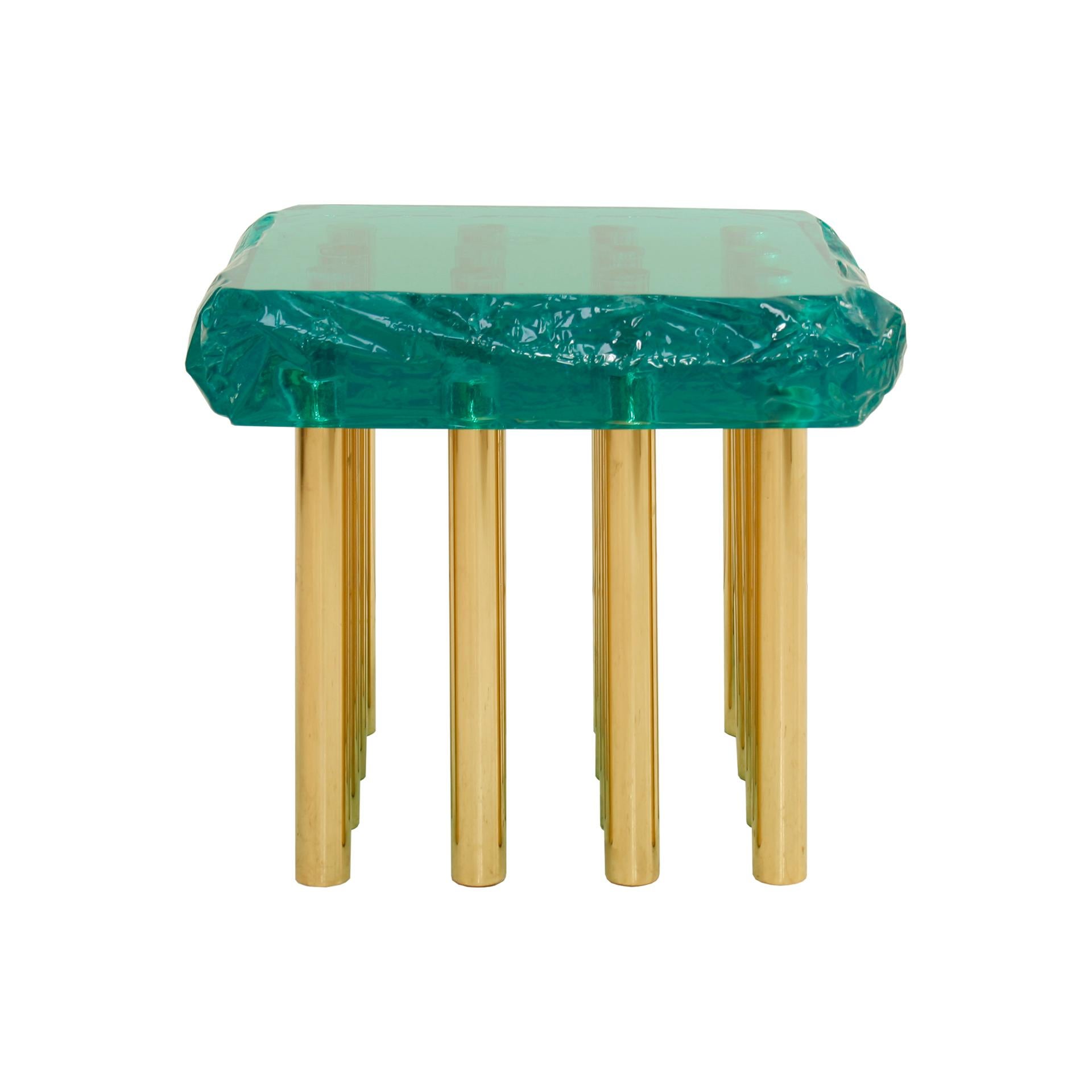 Small coffee table designed and produced by Superego Studio in Italy. Made of a 12 cm thick plexiglass board and brass legs.

 