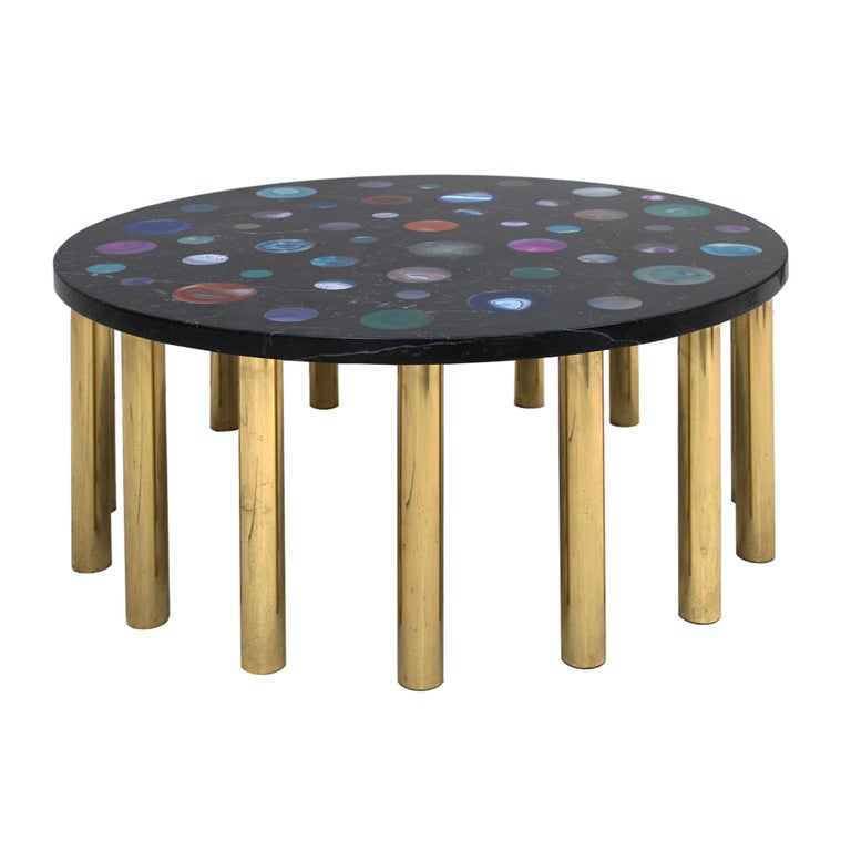 Coffee table designed by Studio Superego, made in black Marquina marble with agates of different colors and with brass legs. Single edition.

Our main target is customer satisfaction, so we include in the price for this item professional and